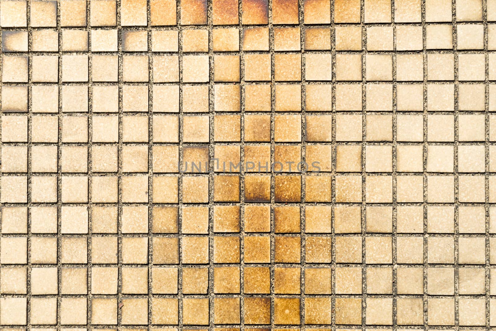 Old Little tiles which have stained unclean and abandoned