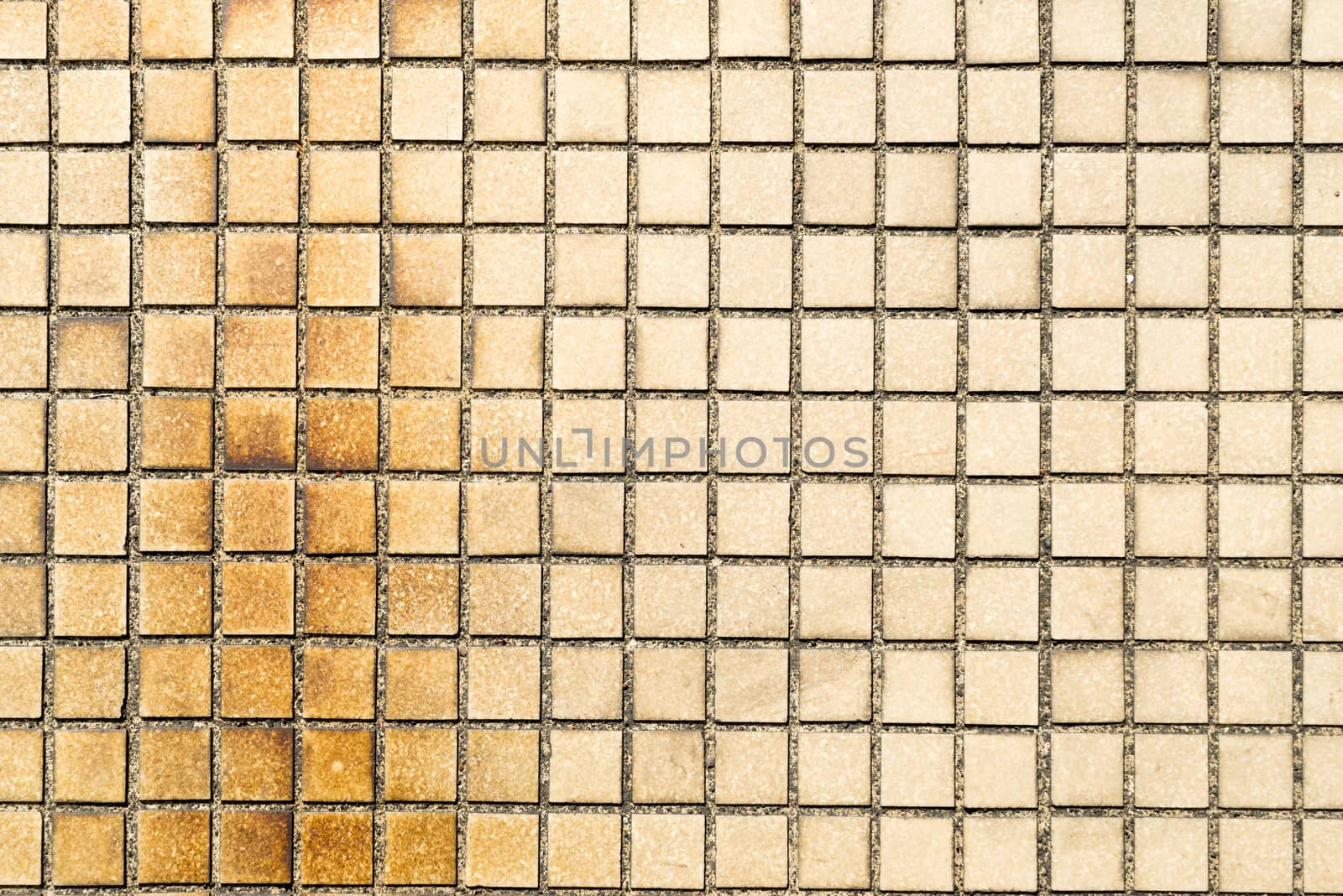 Old Little tiles which have stained unclean and abandoned