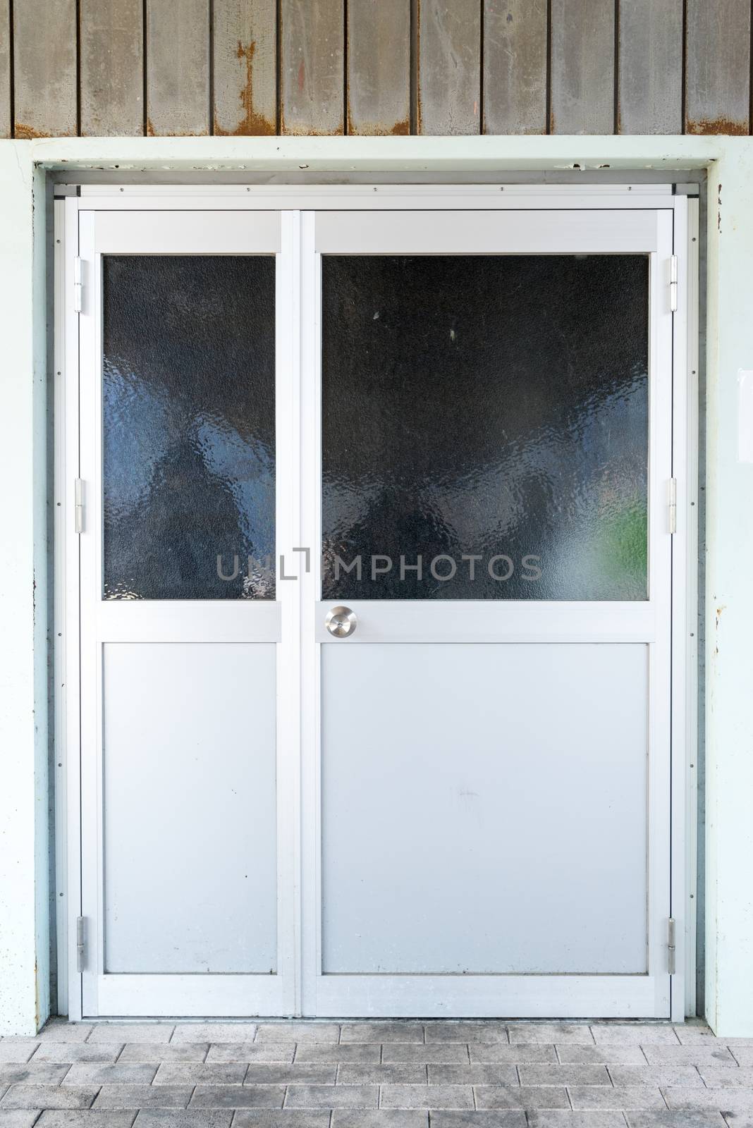 Door made of aluminum with black Glass Window