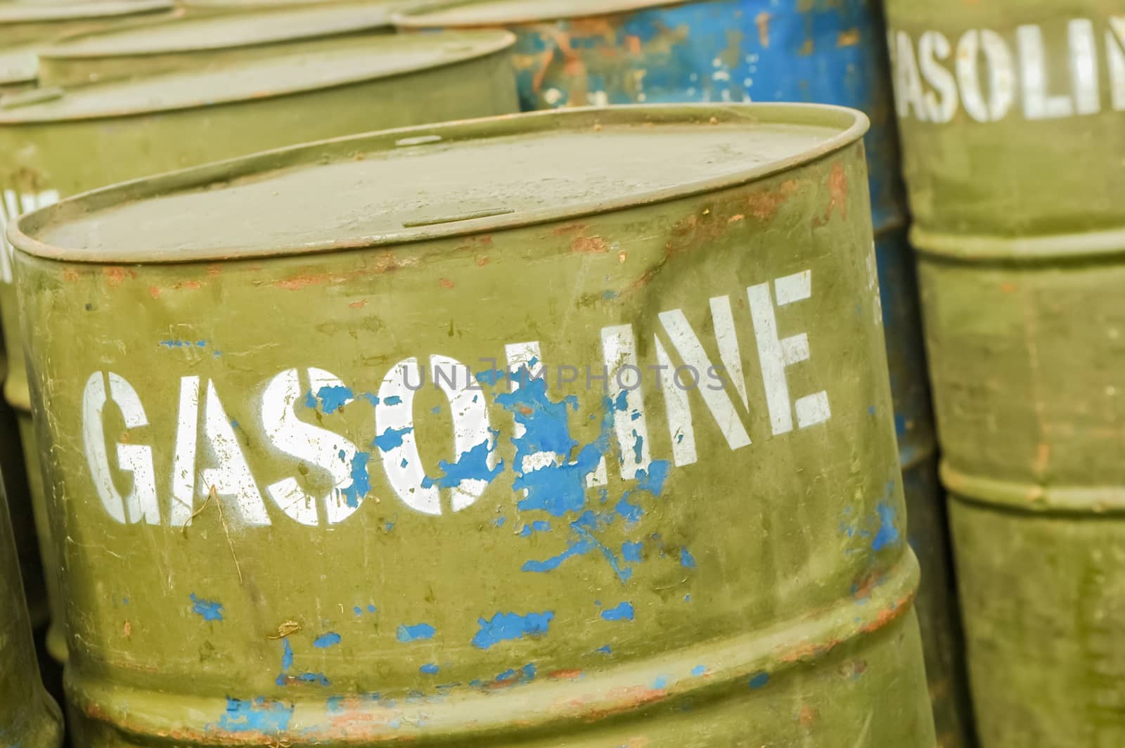 store of well used gasoline fuel drums