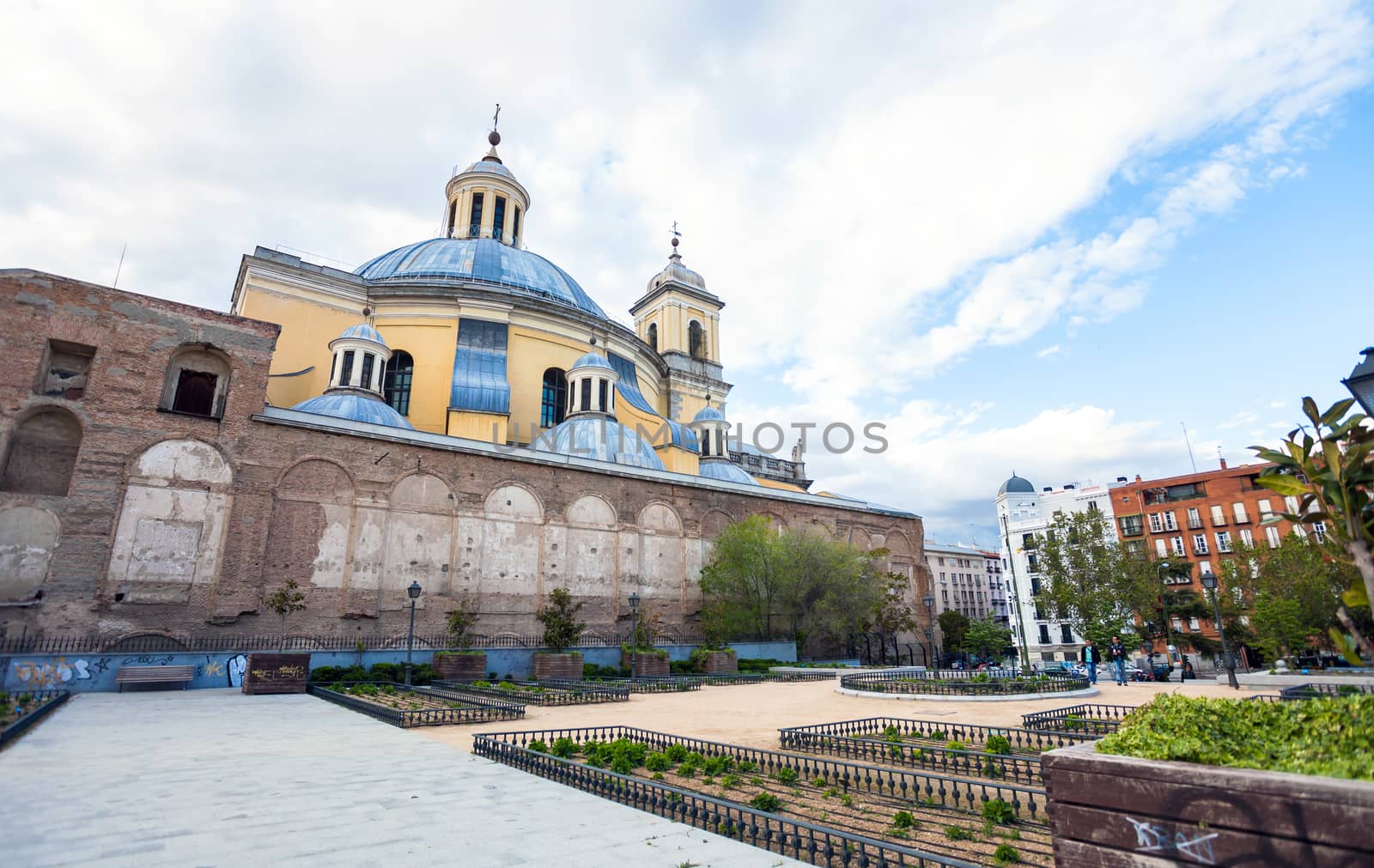 Madrid, Spain - May 6, 2012:  Side view of the Real Basilica de san Francisco el Grande on a sunny spring day in La Latina, Madrid, Spain