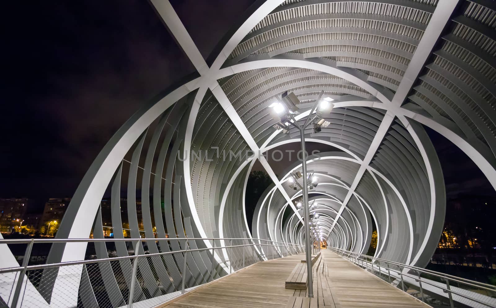 Madrid, Spain - May 5, 2012: Arganzuela Bridge illuminated on a spring night and Madrid Rio Park, Madrid, Spain