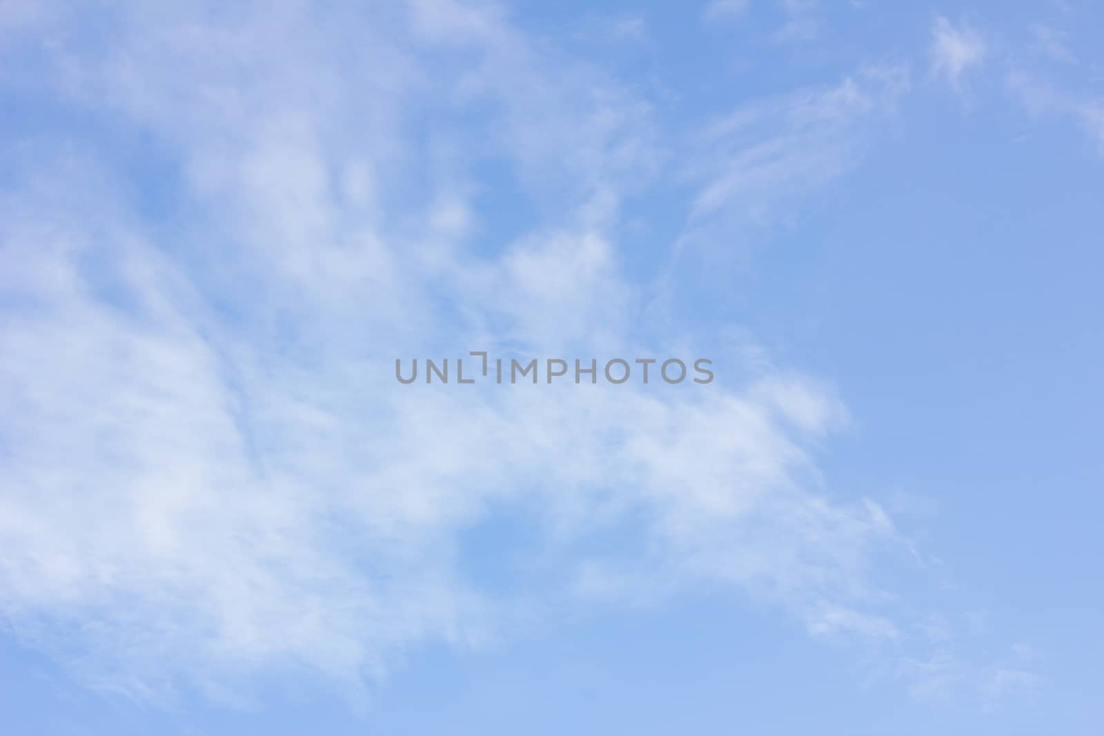 clouds in the wonderful blue sky used as background 