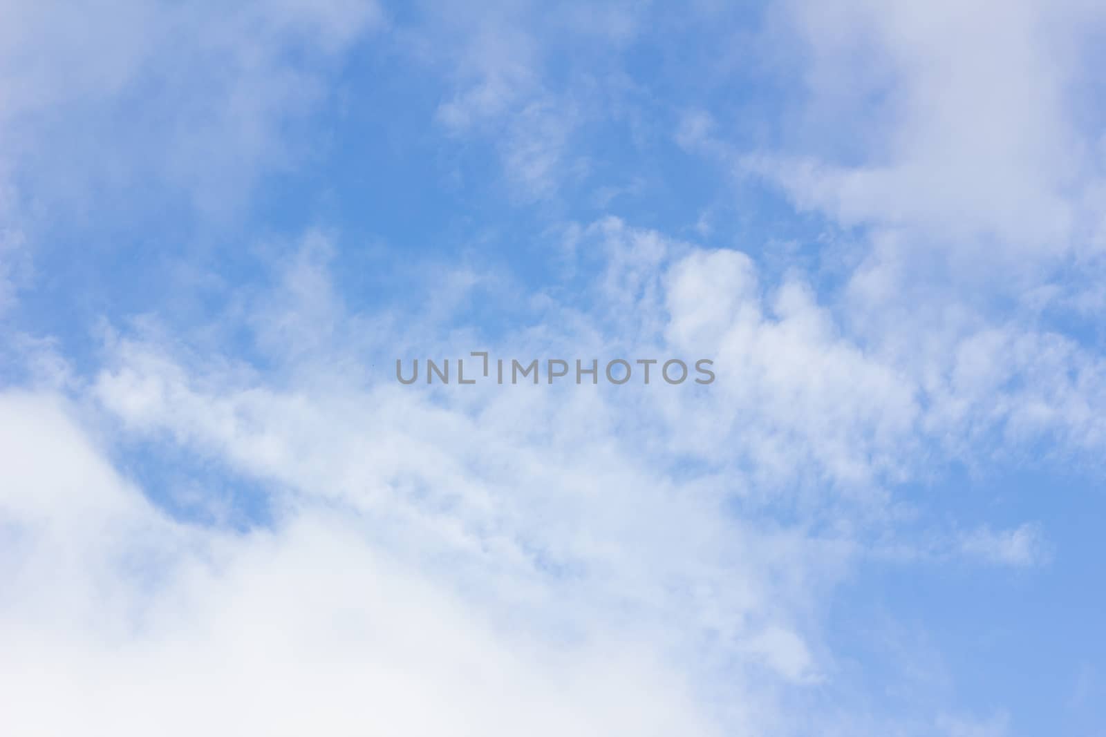clouds in the wonderful blue sky used as background 
