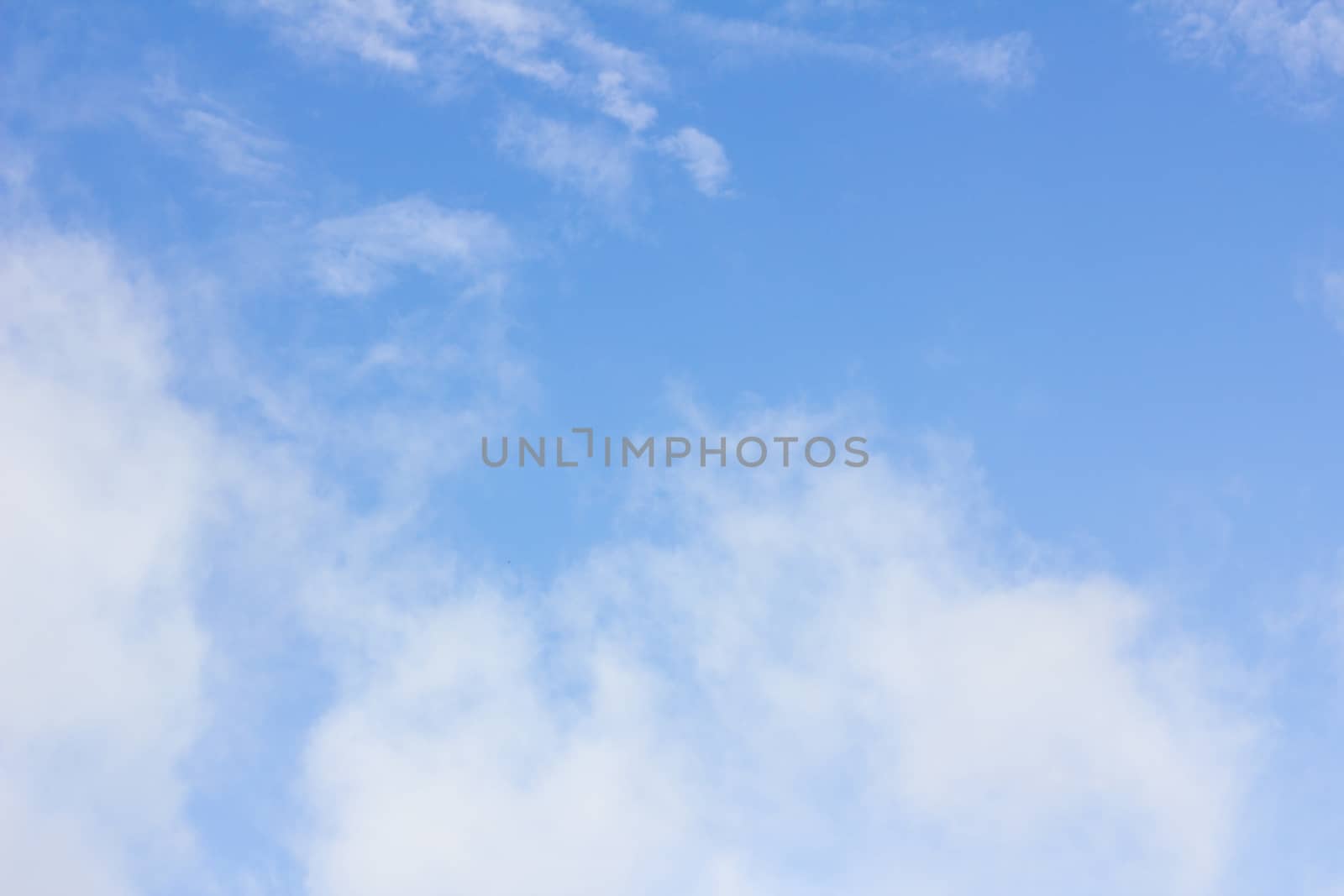 clouds in the wonderful blue sky used as background 