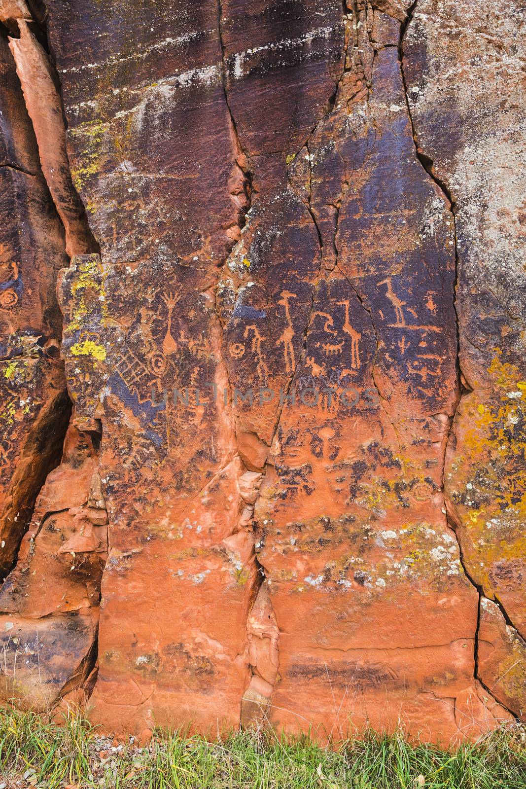 Large rock panel with many symbolic petroglyphs
