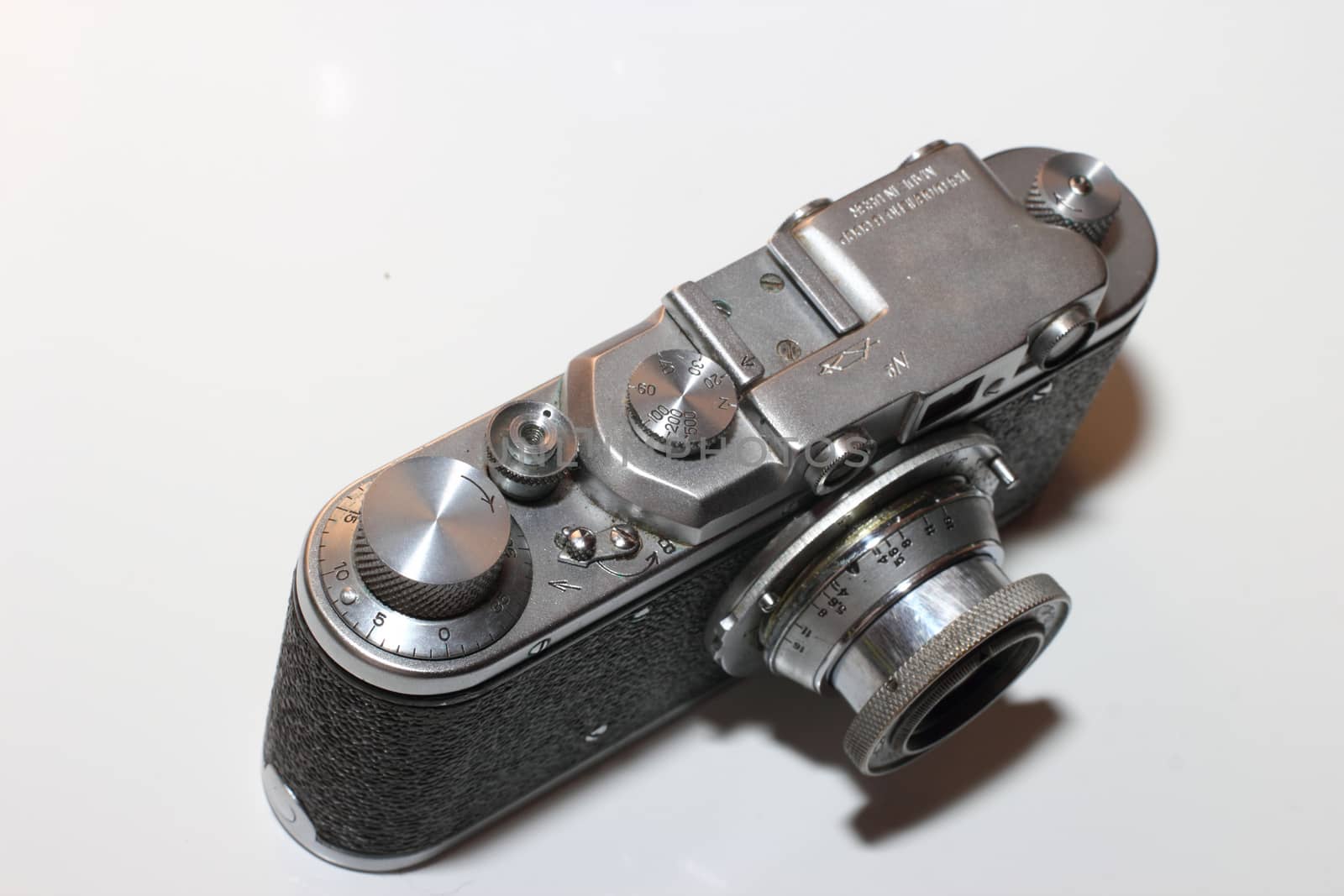 black and metal isolated vintage camera in retro style. 