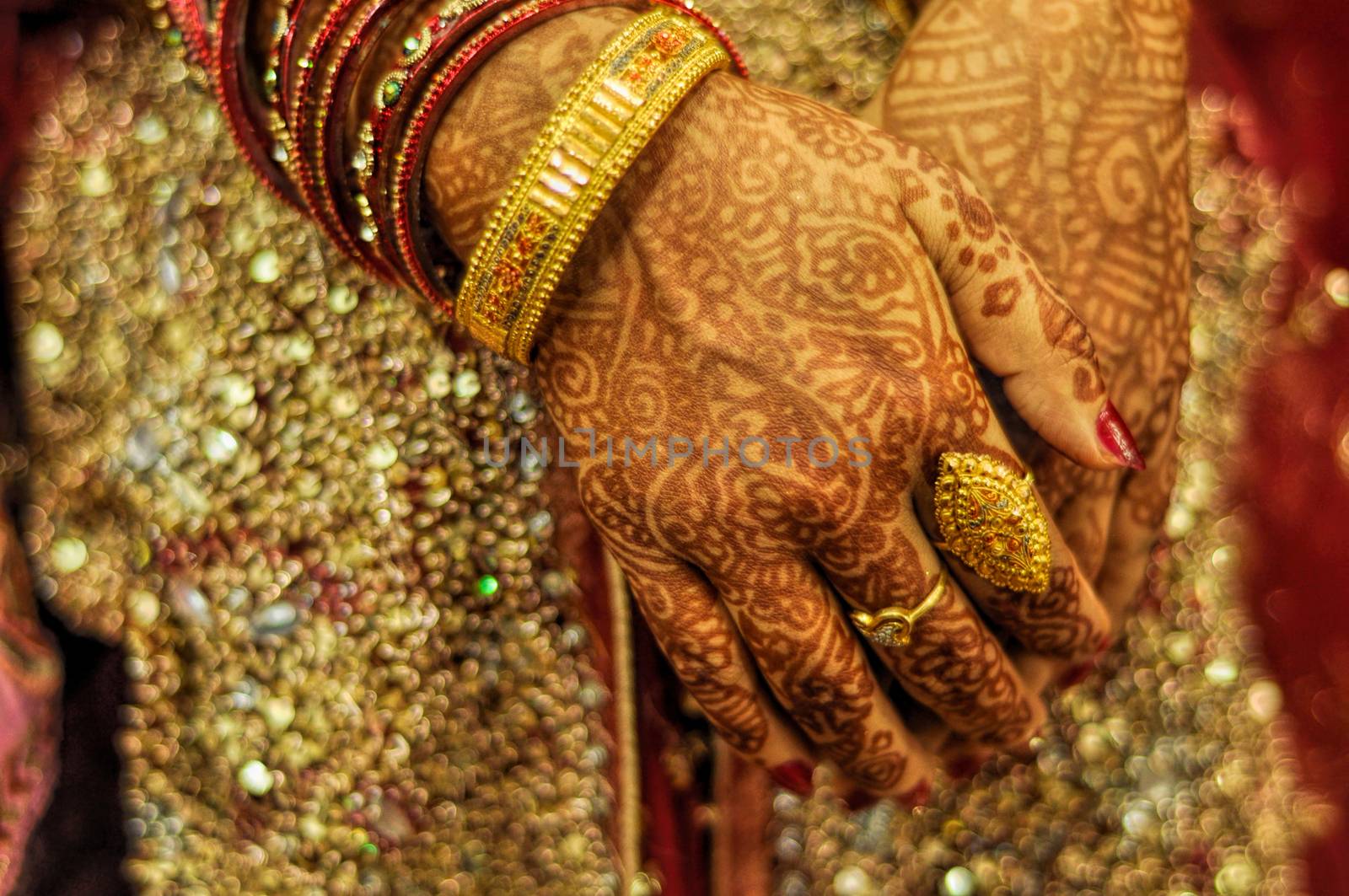 Traditional henna on brides hands on wedding in Bangladesh