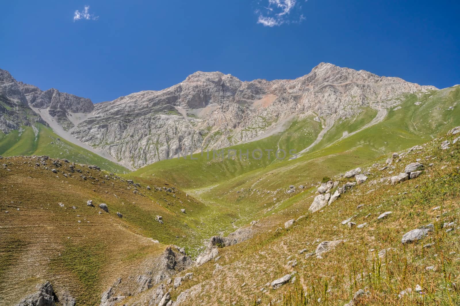 Scenic peaks in mountain range Tien-Shan in Kyrgyzstan