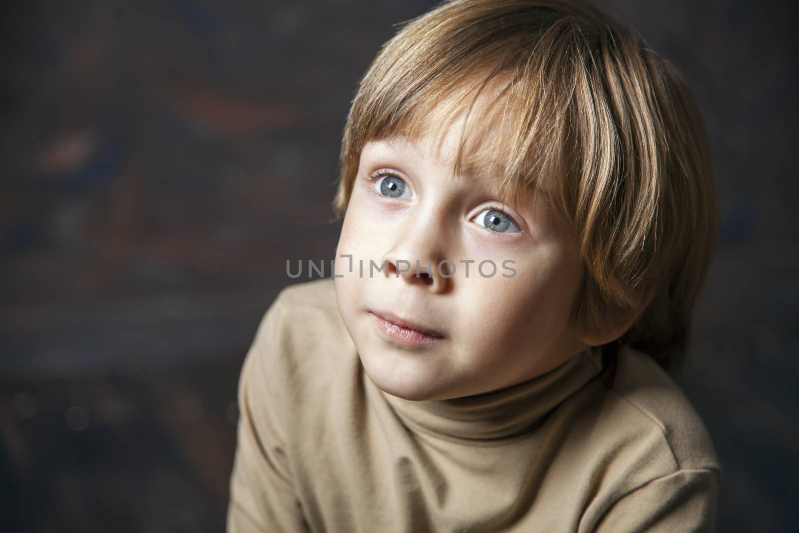 Little young beautiful boy spiritual peaceful praying by anelina