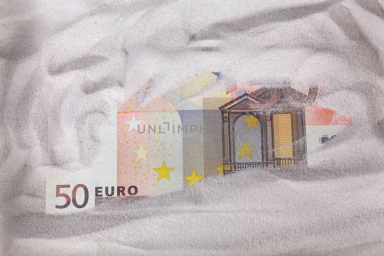 Euro Note in Sand