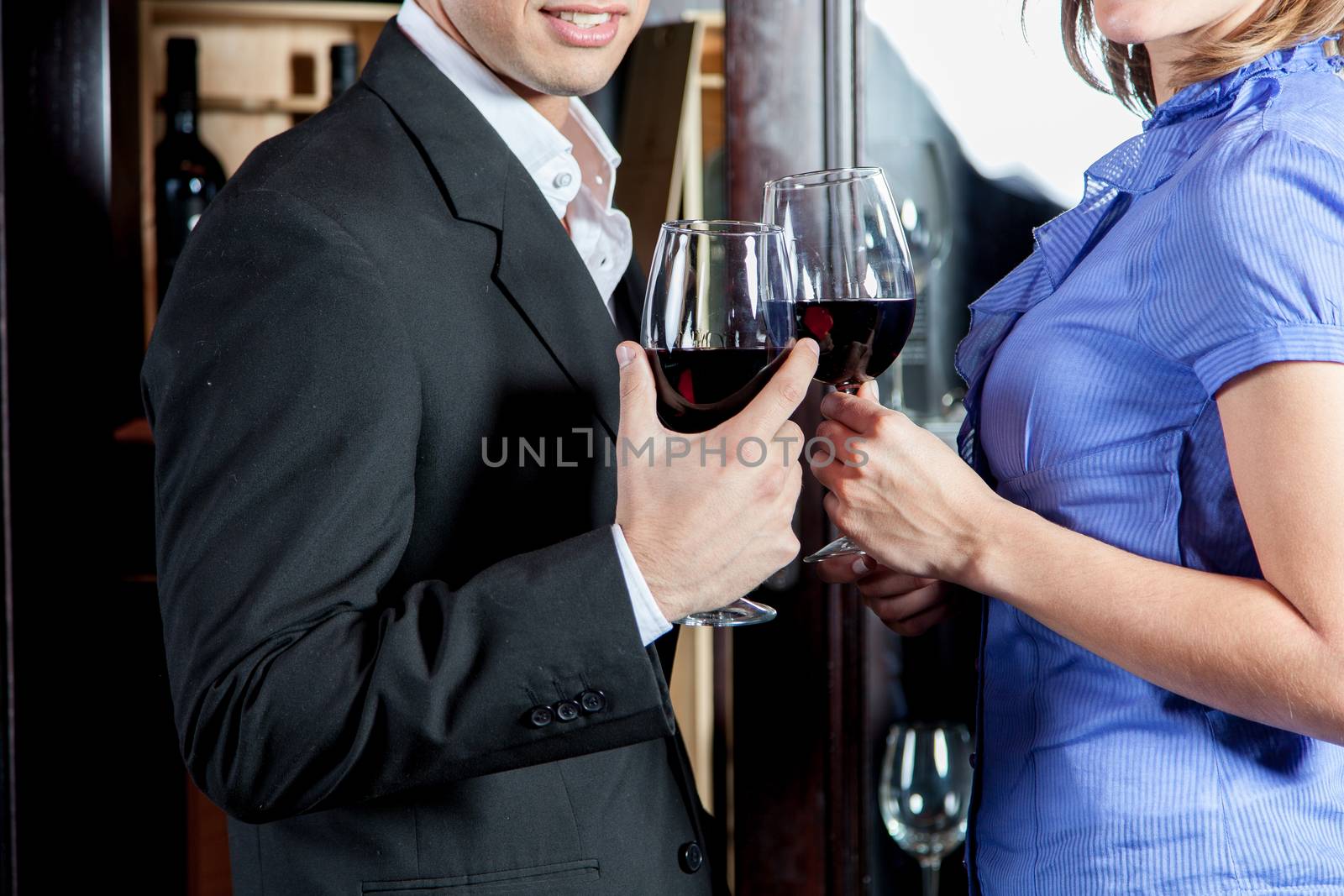 Young couple in love making a toast