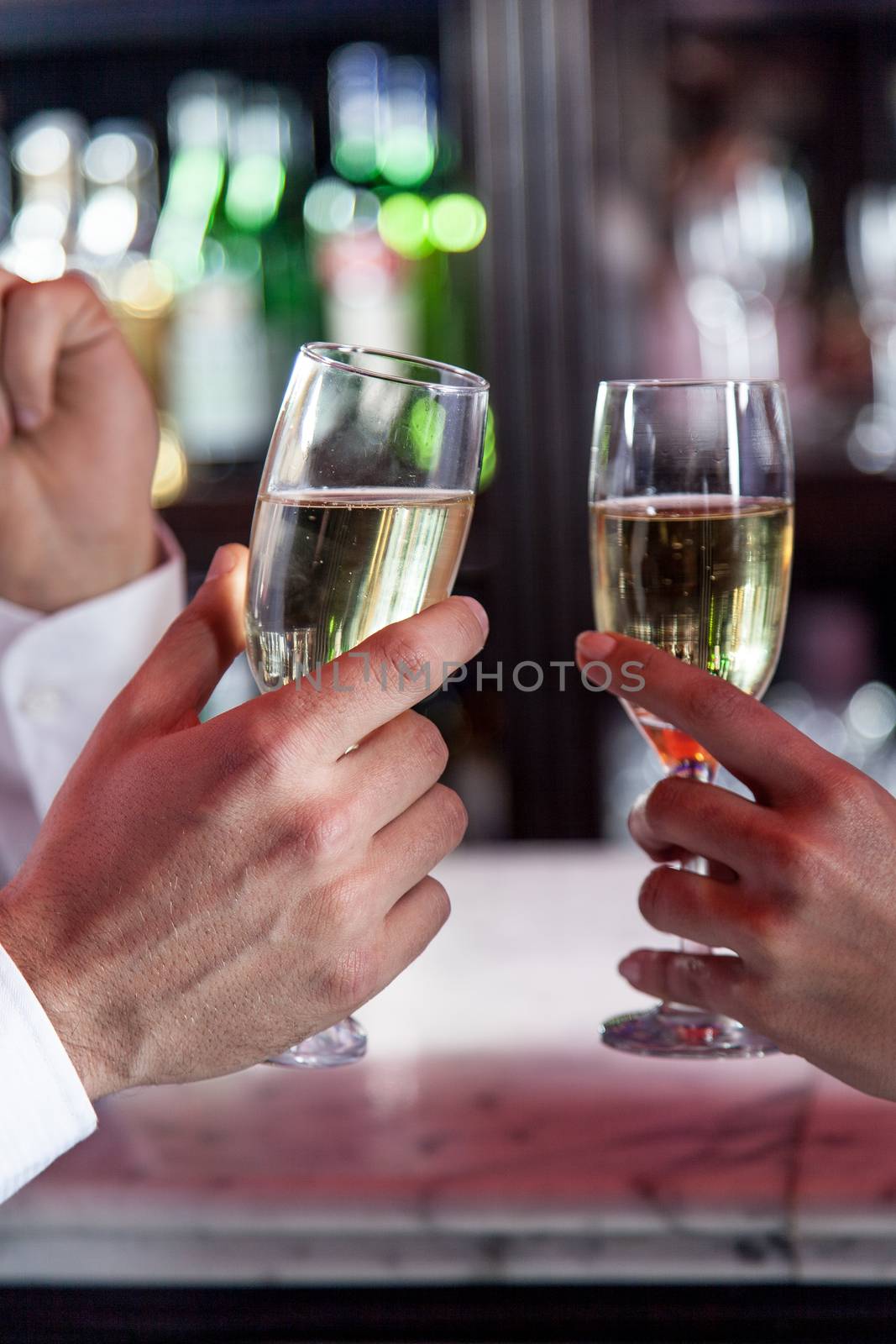 Young couple in love making a toast