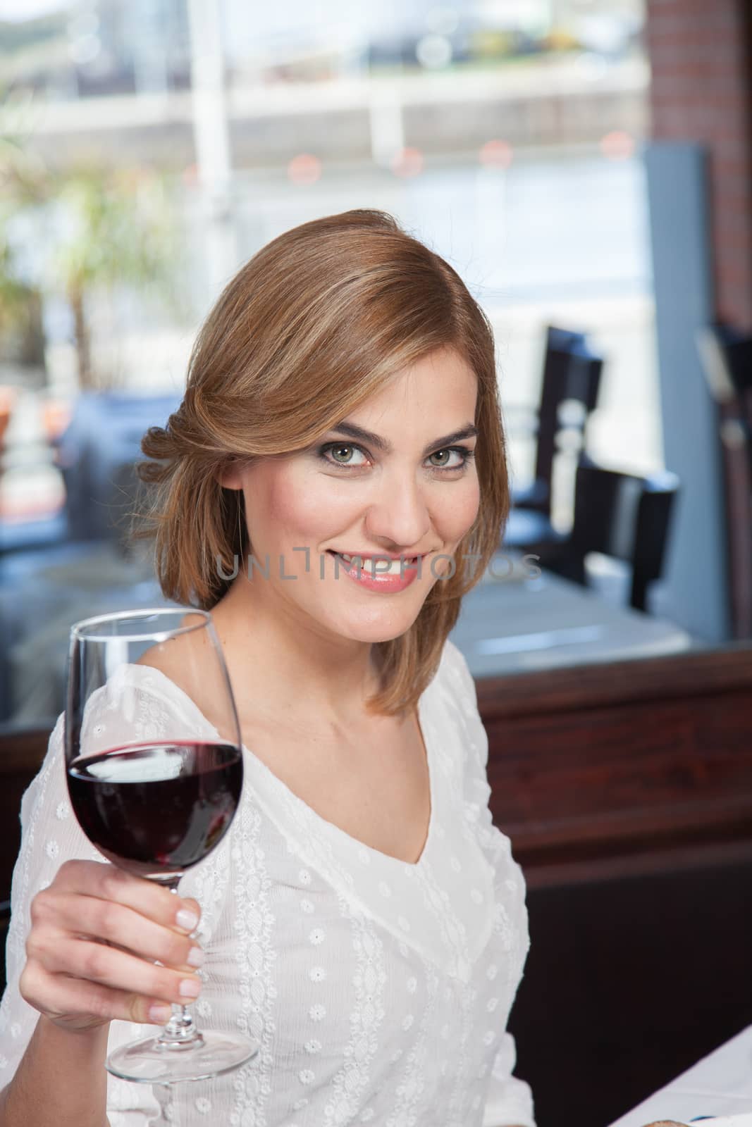 Beautiful woman making a toast