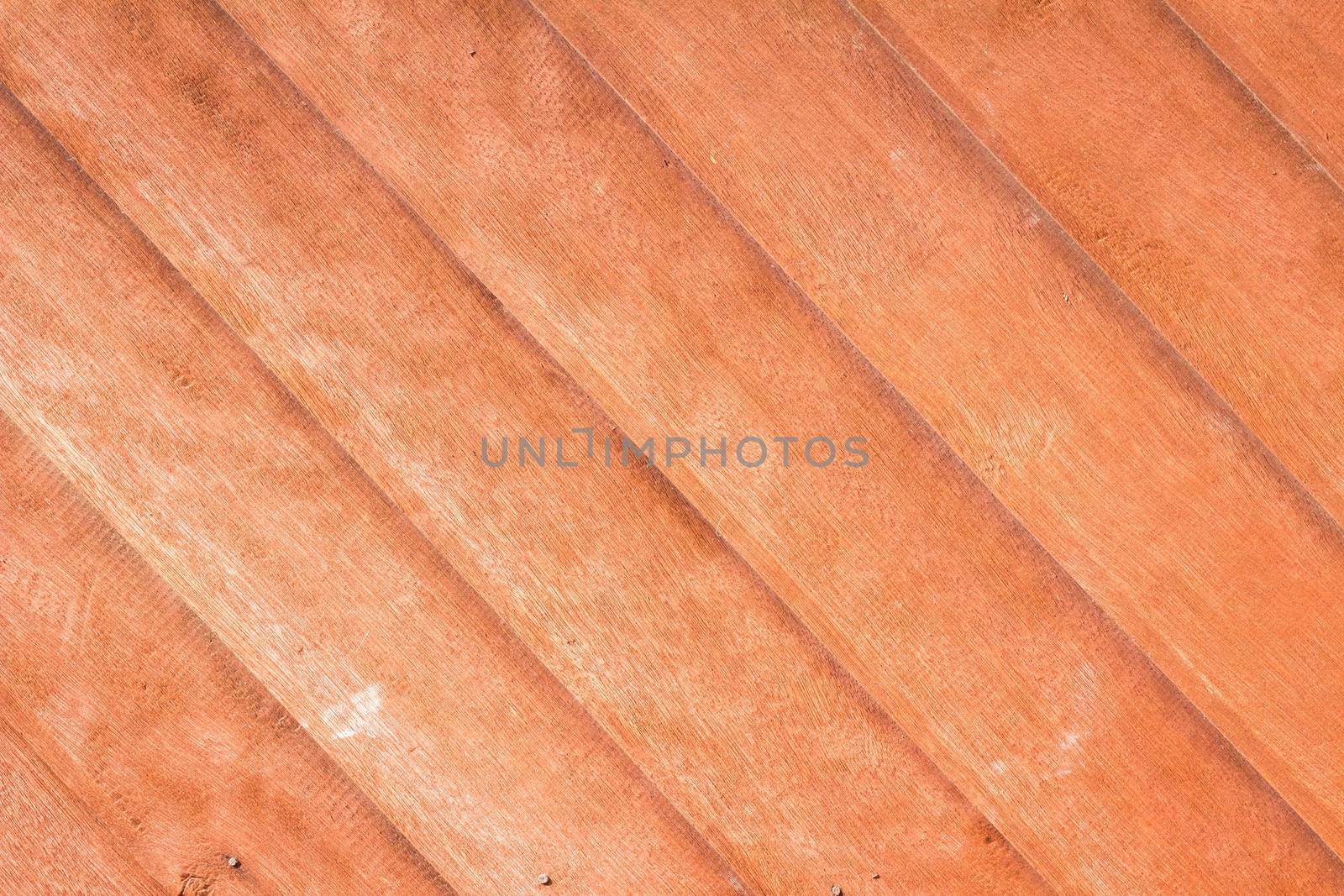 close-up of teak wood plank texture with natural patterns / teak plank / teak wall with diagonal pattern