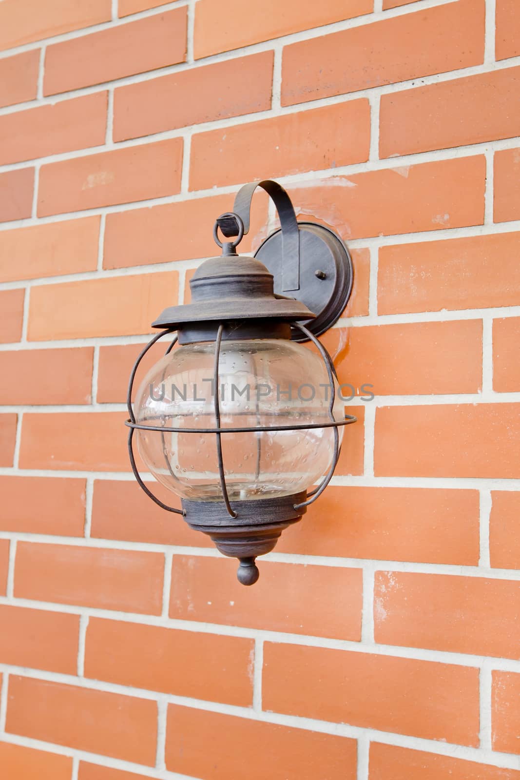 Vintage lantern on a wall.