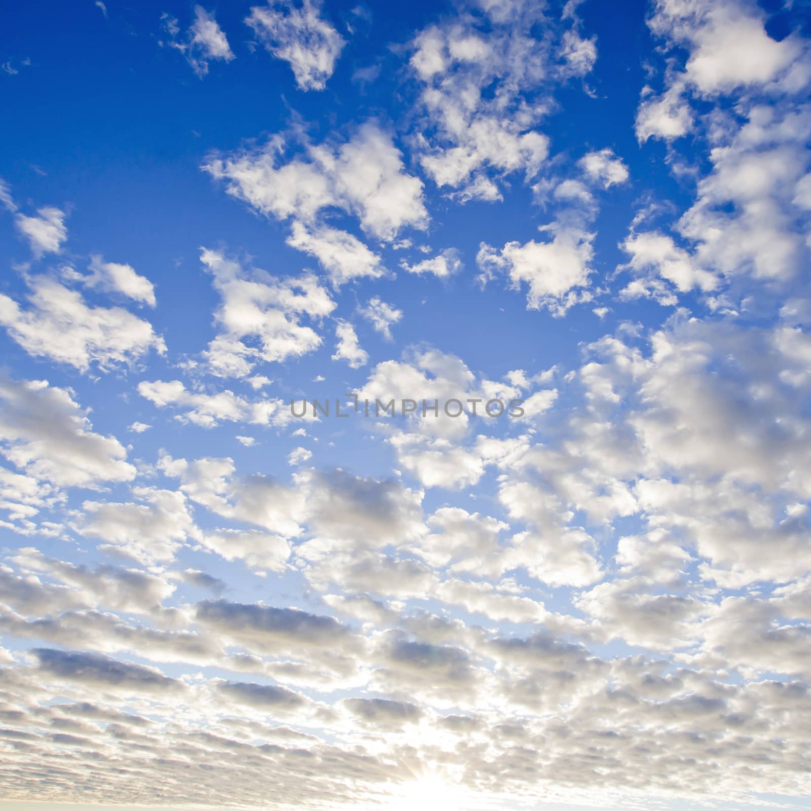 blue sky with clouds closeup by art9858
