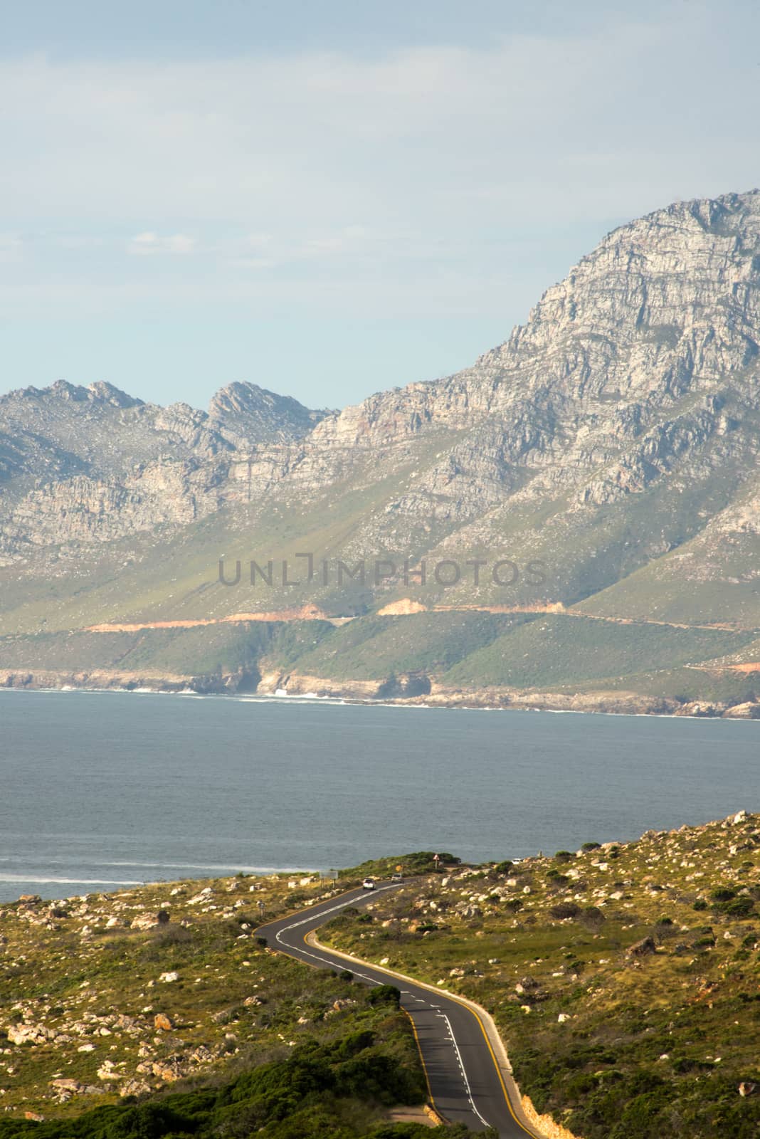 The scenic road from Gordon's Bay to Rooi Els as the sun starts setting over False Bay.