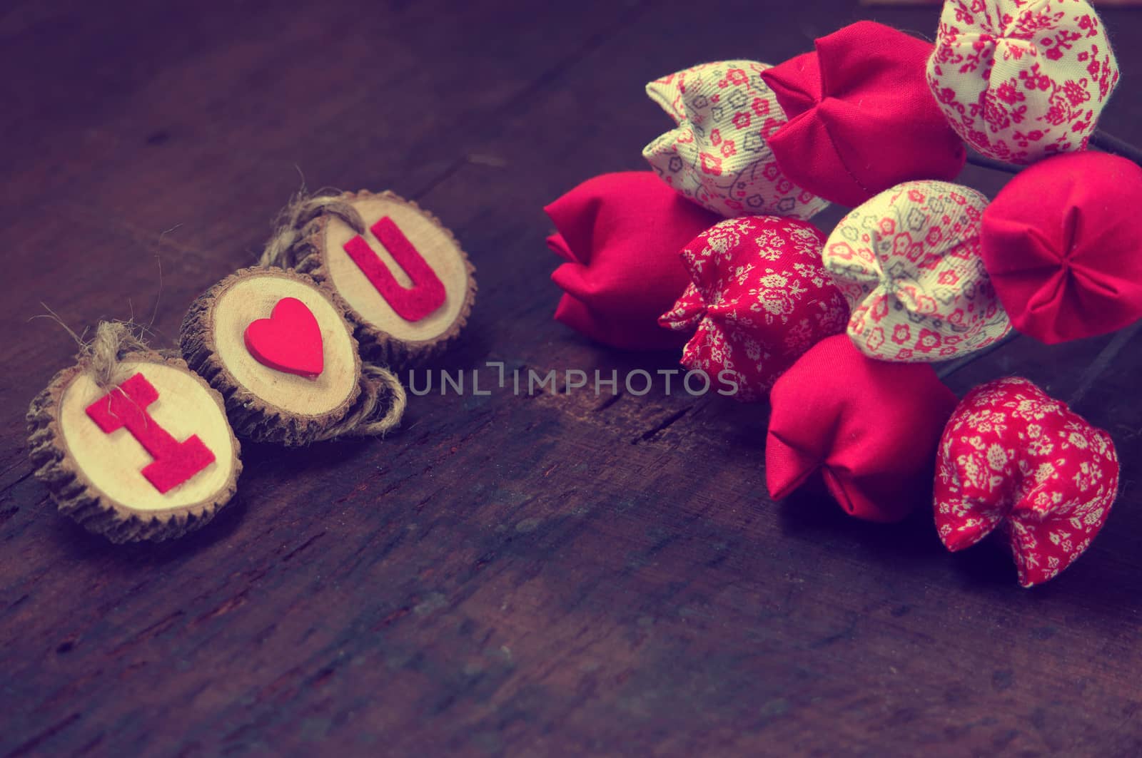 Valentine background, amazing vintage style, handmade flower, I love you message on wooden,  purple pink and red color, Valentine day is the day for couple, they give lovely gift for lover