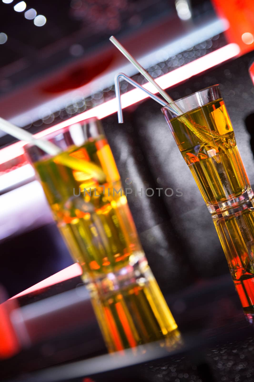 fresh apple juice in transparent glass in bar.Glass in full