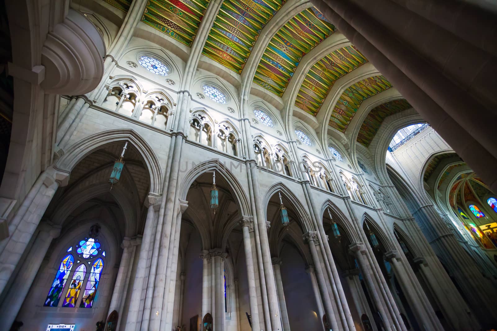 Madrid, Spain - May 6, 2012: Cathedral Almudena interior with view of the pipe organ on a sunny day in Madrid, Spain