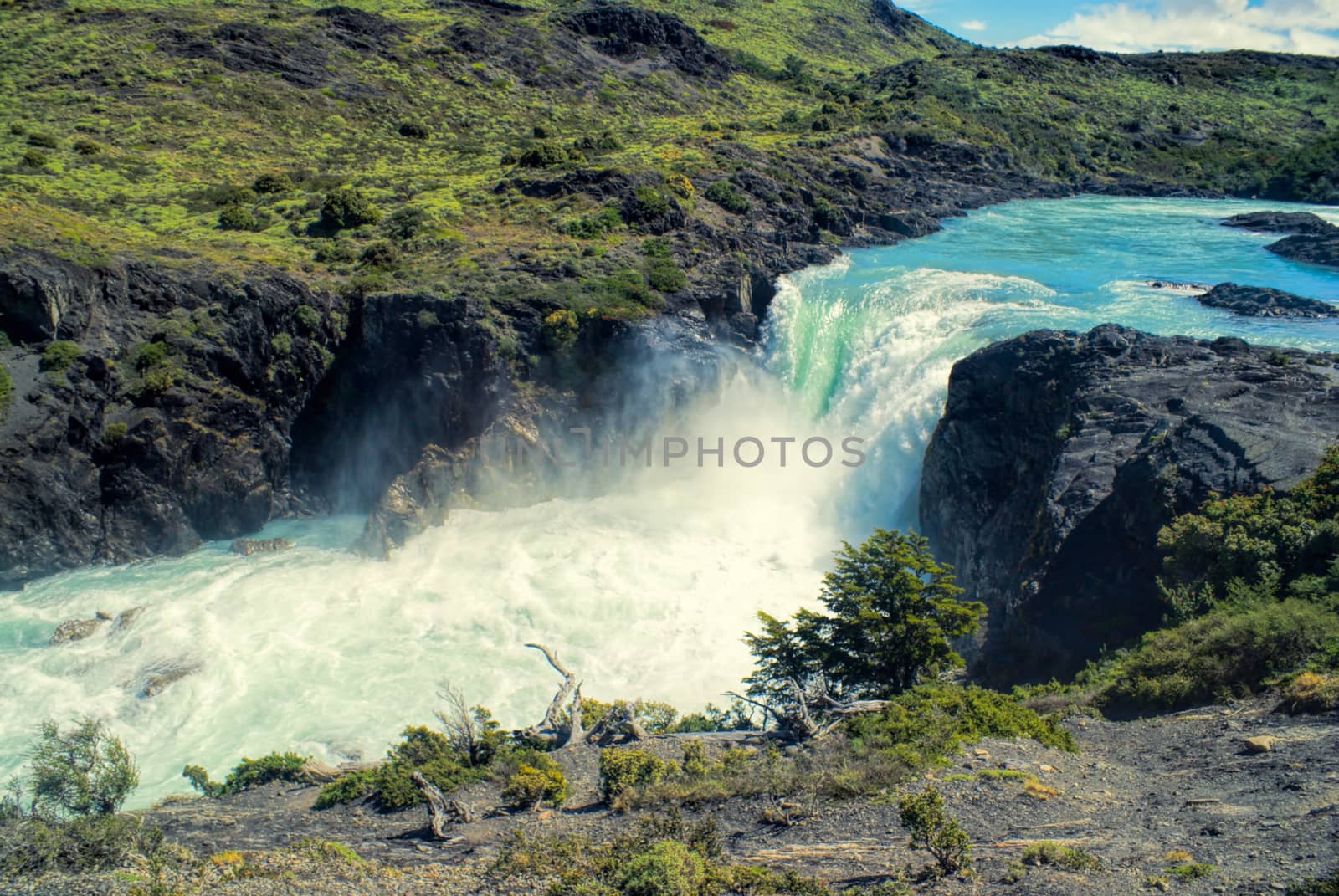 Waterfall in Torres del Paine in south American Andes                   