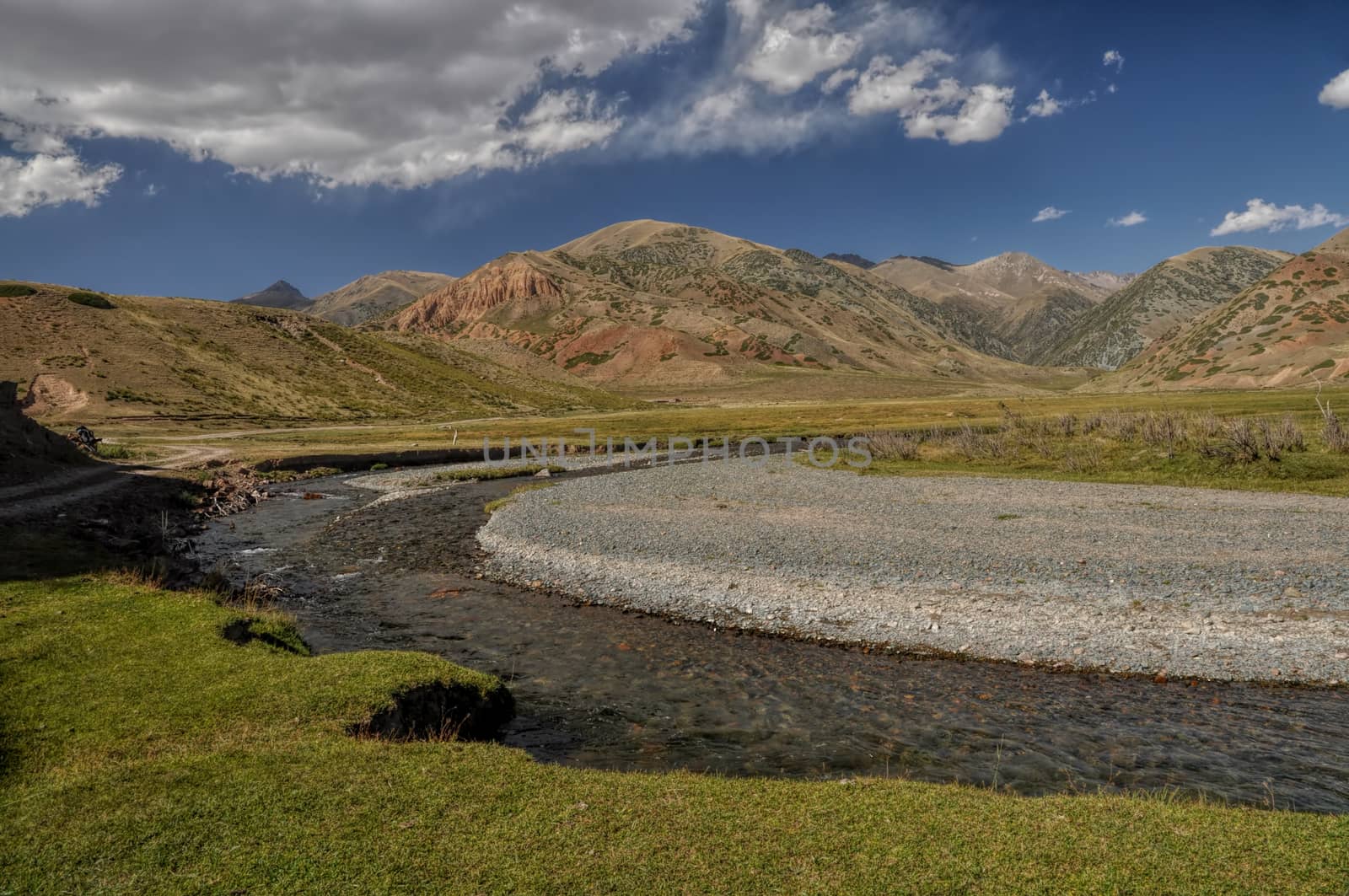 River in Kyrgyzstan by MichalKnitl