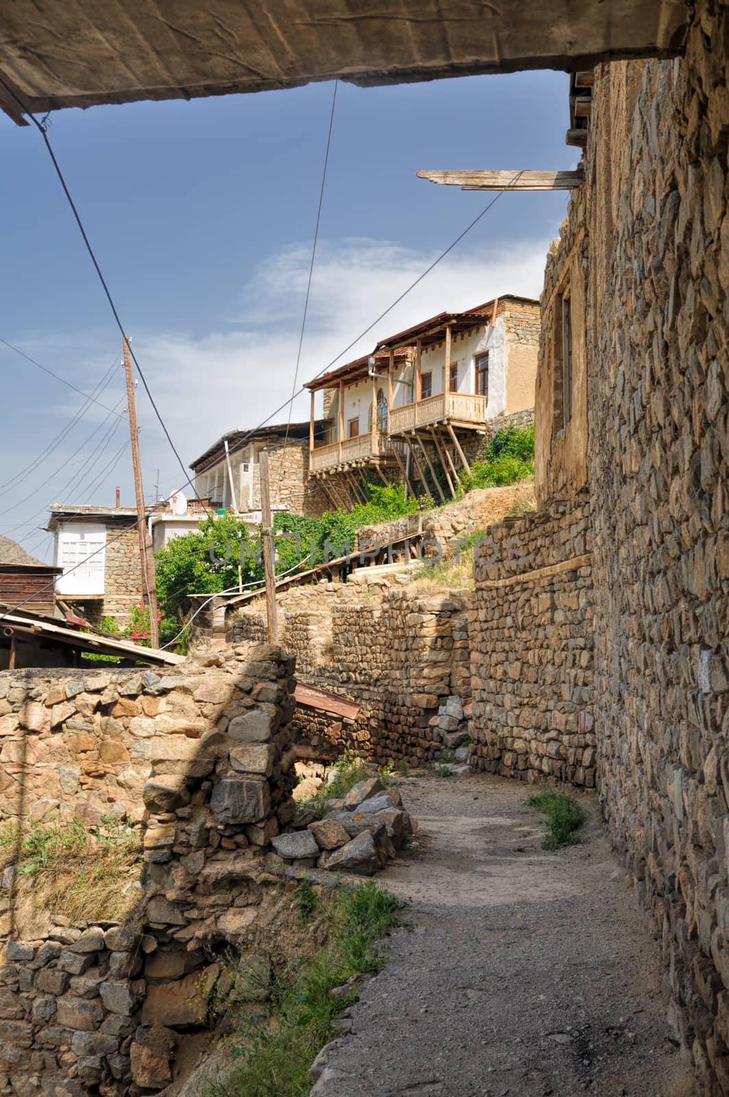 Old narrow street in armenian town Meghri