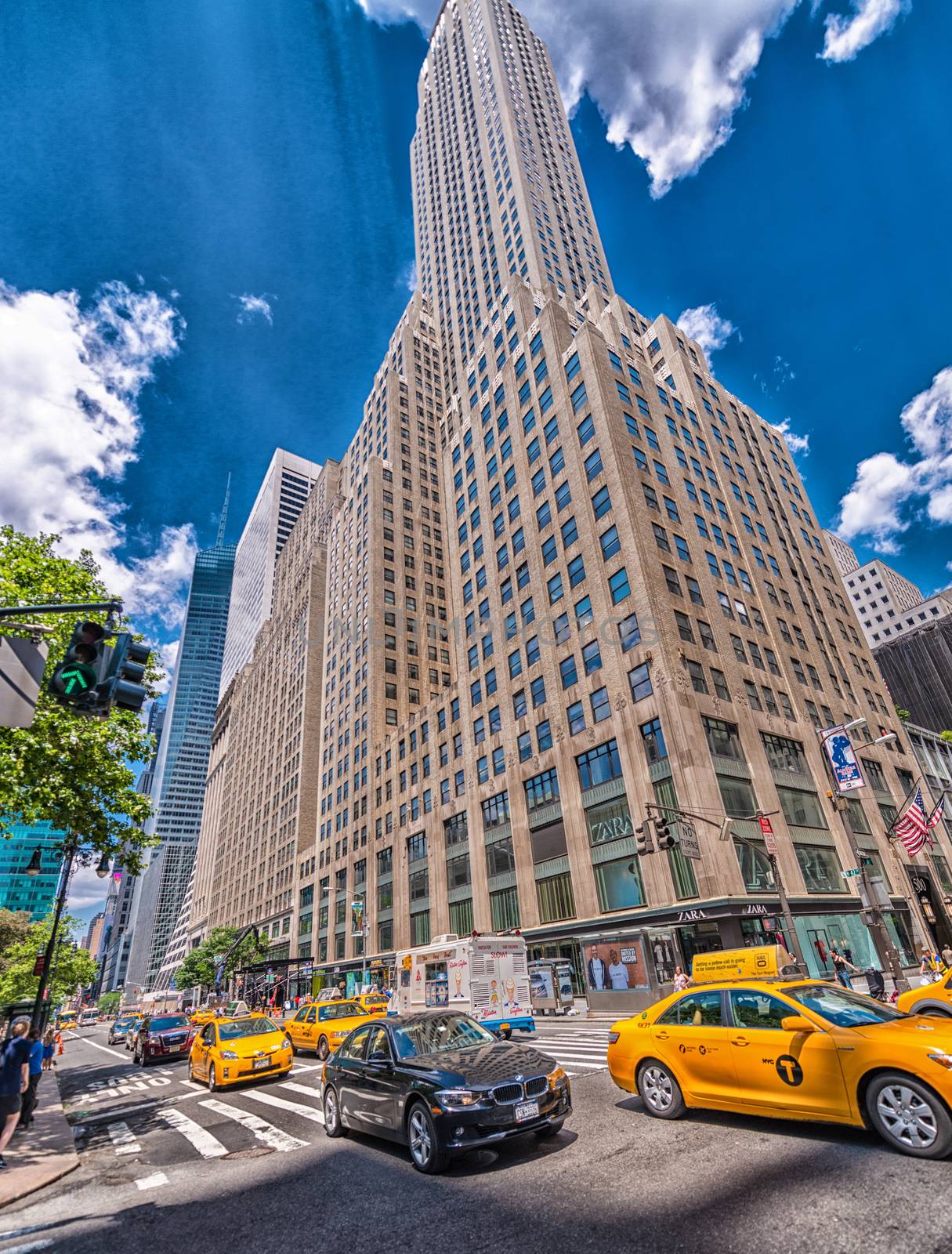 NEW YORK CITY - MAY 23, 2013: Yellow cabs speed up in Manhattan. In New York there are more than 13,000 taxis.