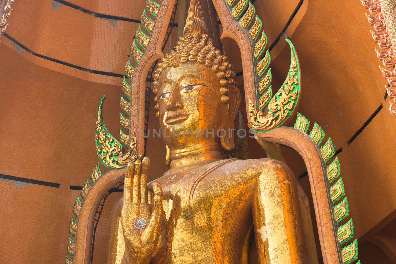 Hand of Big golden buddha statue Wat Tham Sua(Tiger Cave Temple), Kanchanaburi thailand