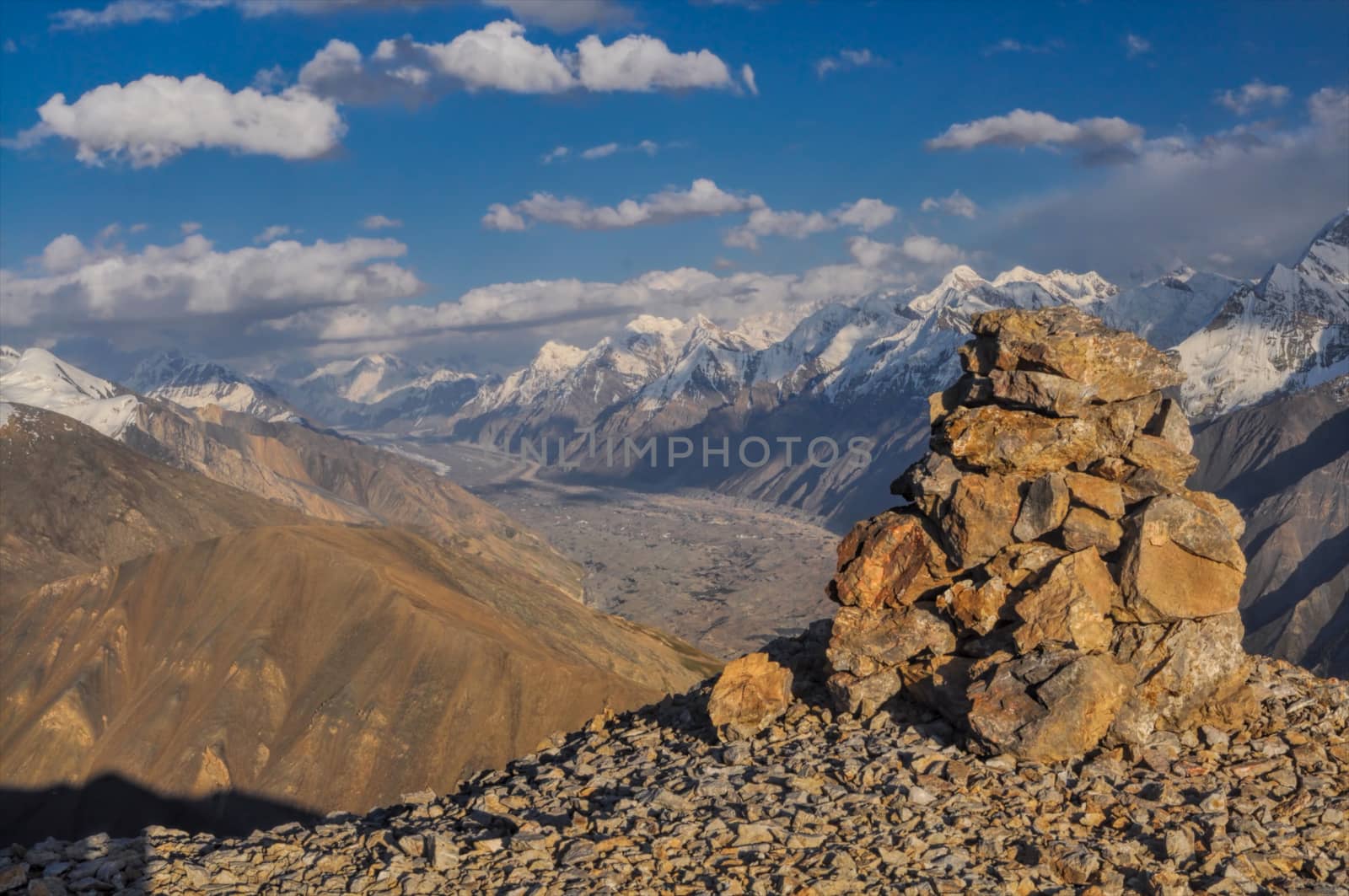 Scenic mountain peaks above  Engilchek glacier in Tian Shan mountain range in Kyrgyzstan