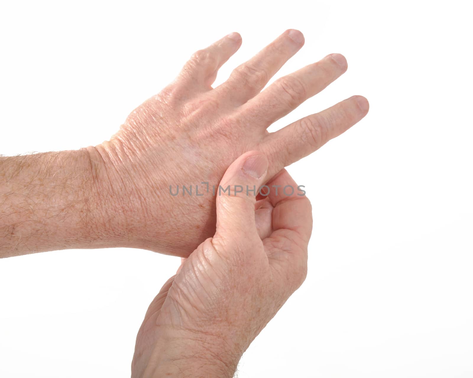 Man holding his aching thumb