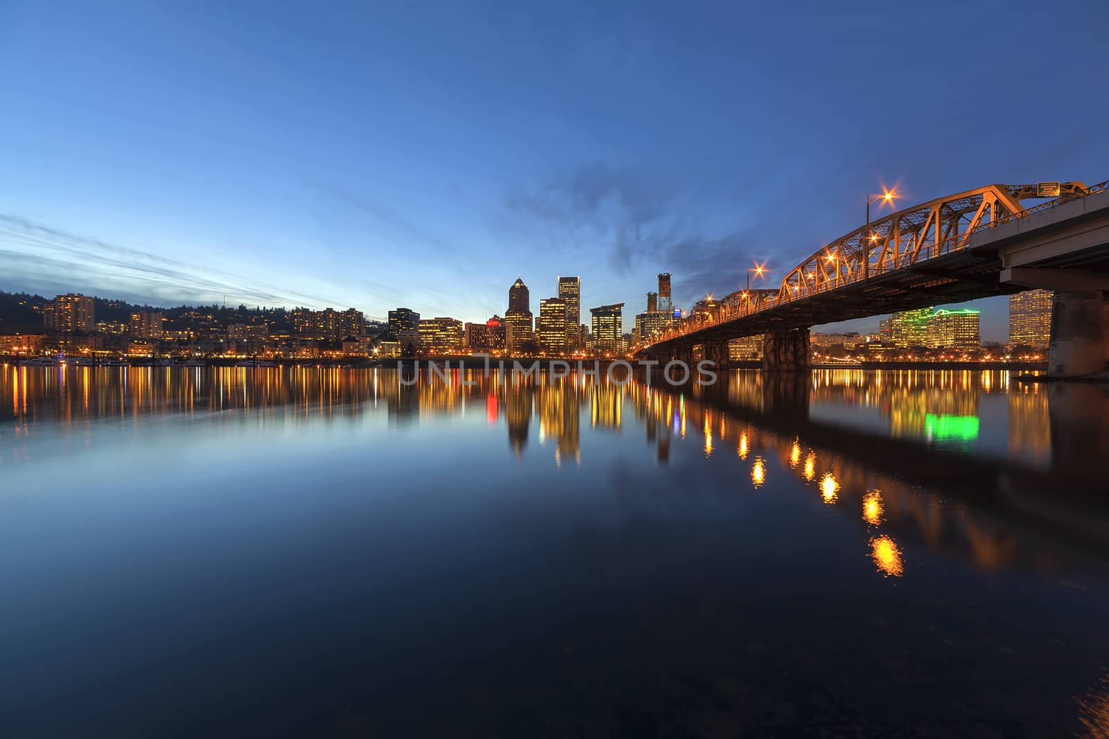 Portland Oregon Downtown City Skyline Along Willamette River by the Hawthorne Bridge at Evening Blue Hour