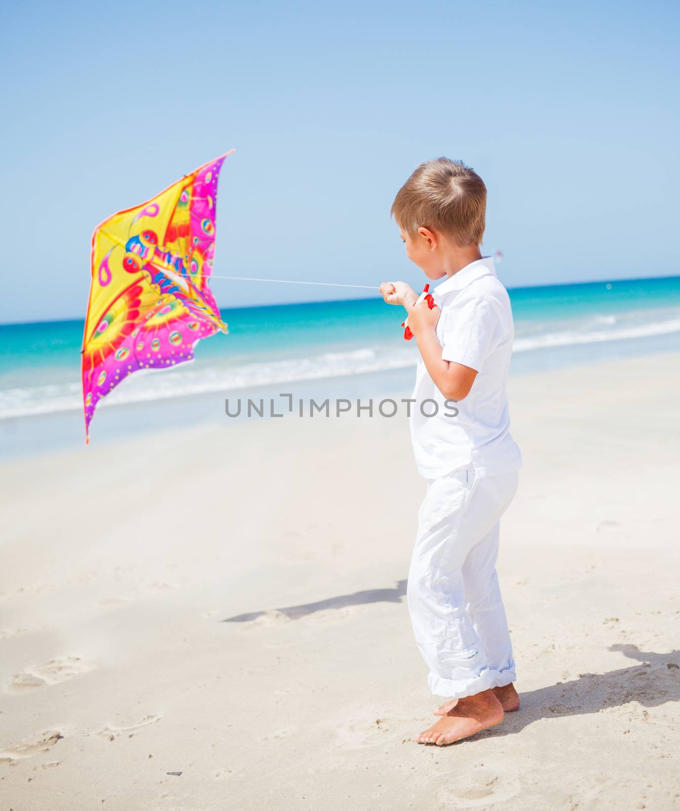 Boy with kite. by maxoliki