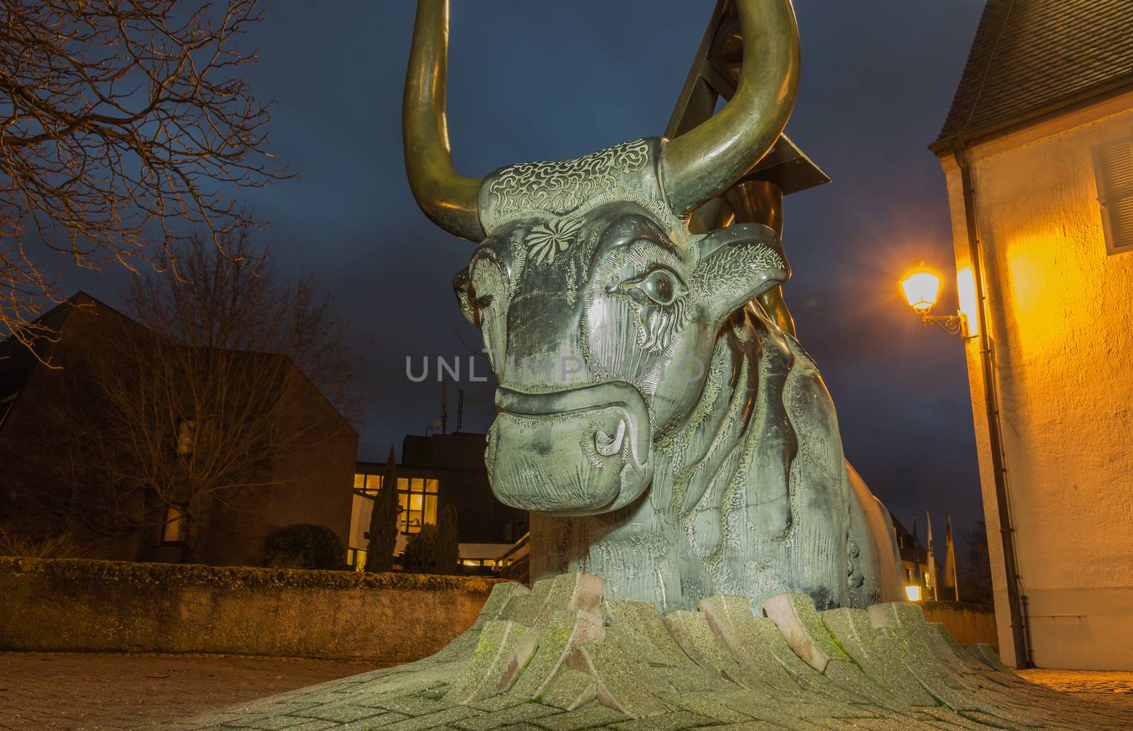  A bull bursts through bricks in Breisach am Rhein,Germany,Europe