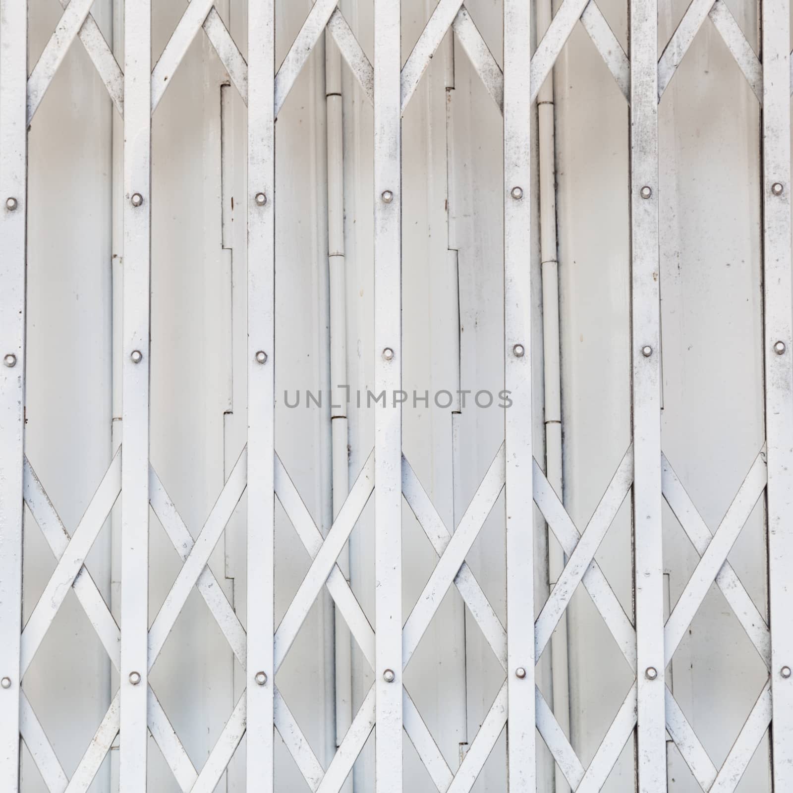 White iron gate. A piece of white iron gate of the house.