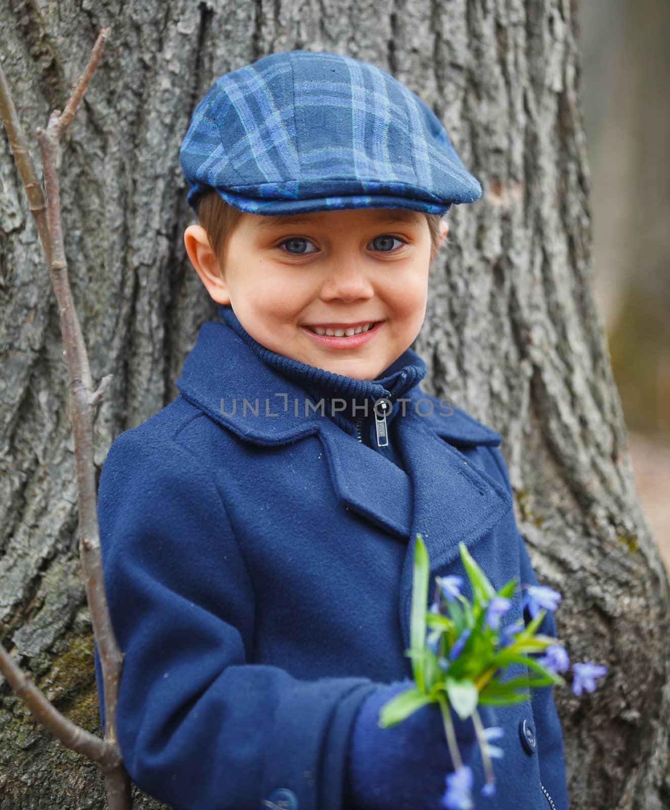 Boy in spring forest by maxoliki