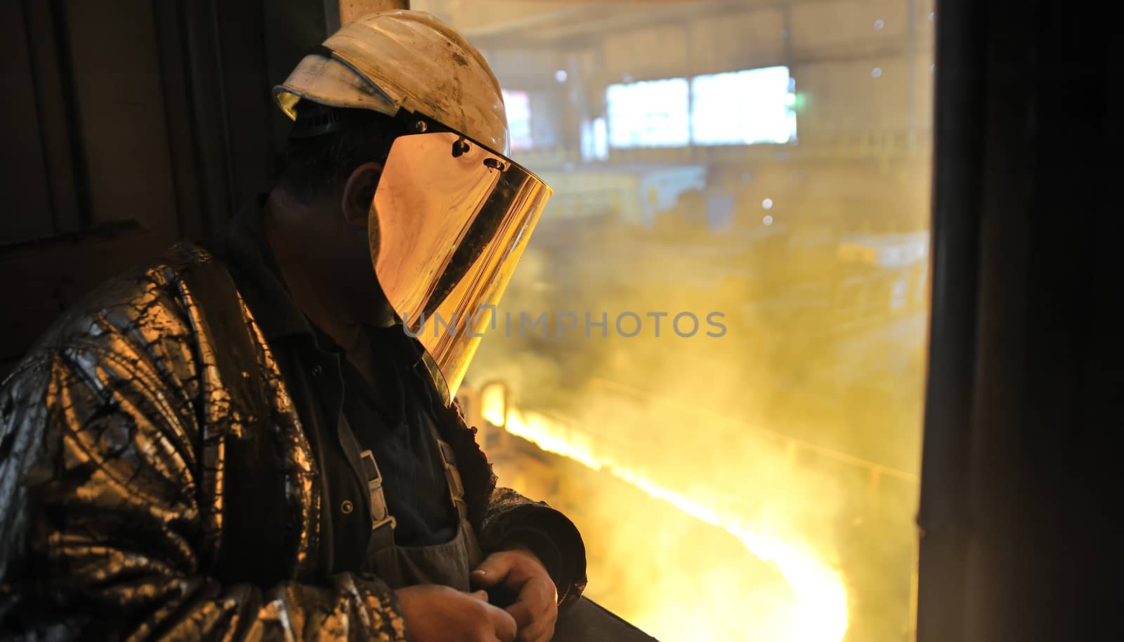 worker and  production of cast iron inside of plant