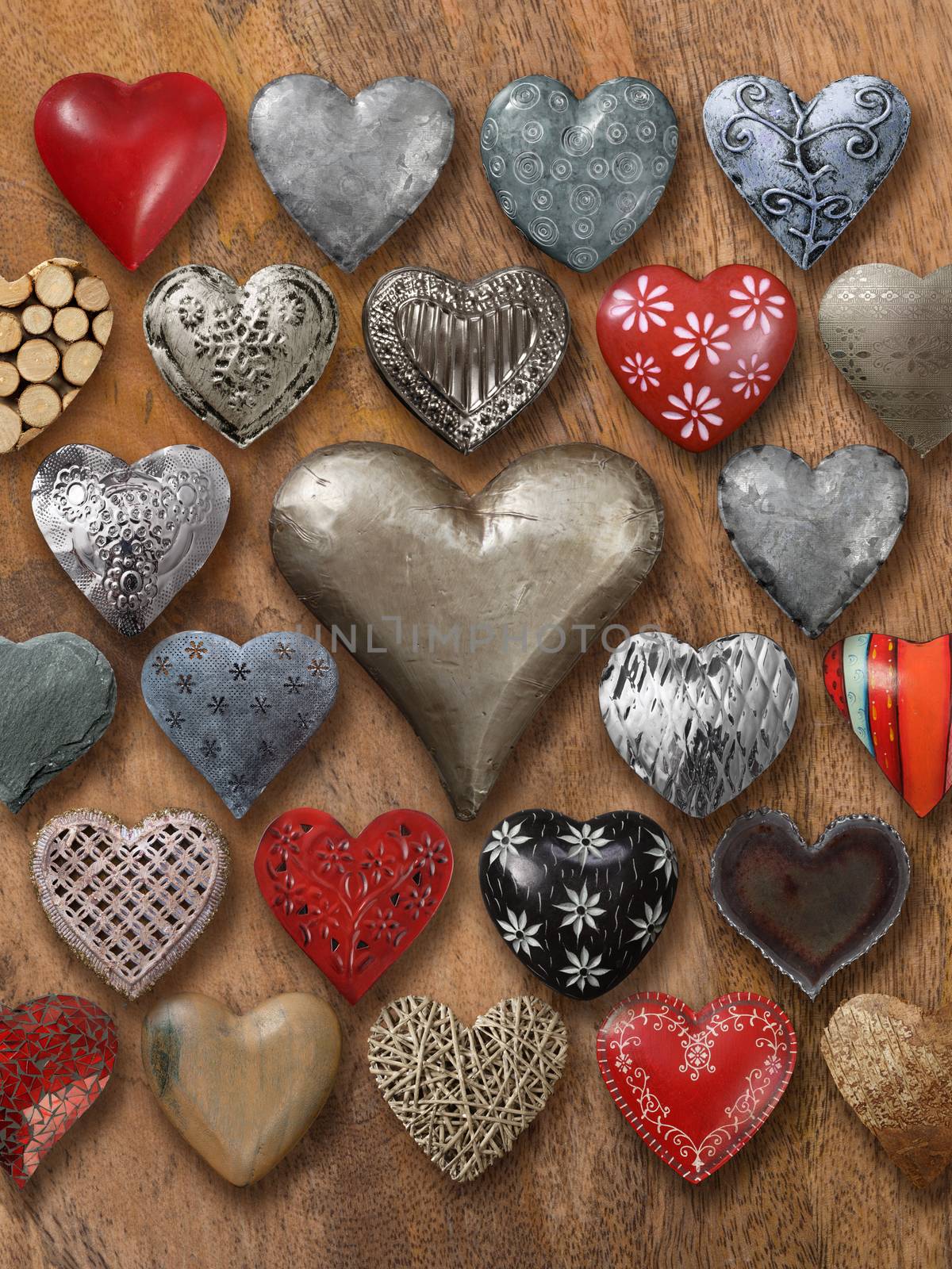Photos of many heart-shaped things made of stone, metal and wood on wood background.
