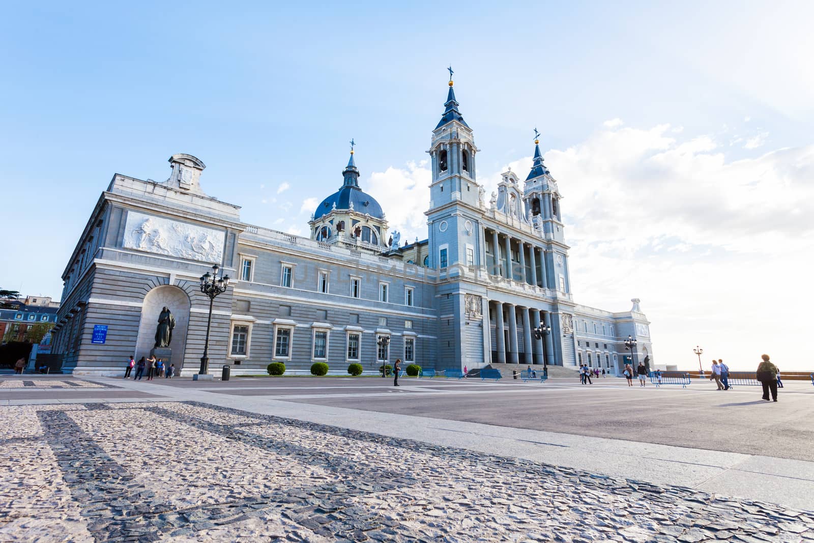 Madrid, Spain - May 6, 2012: Cathedral Almudena with tourists on a spring day in Madrid, Spain