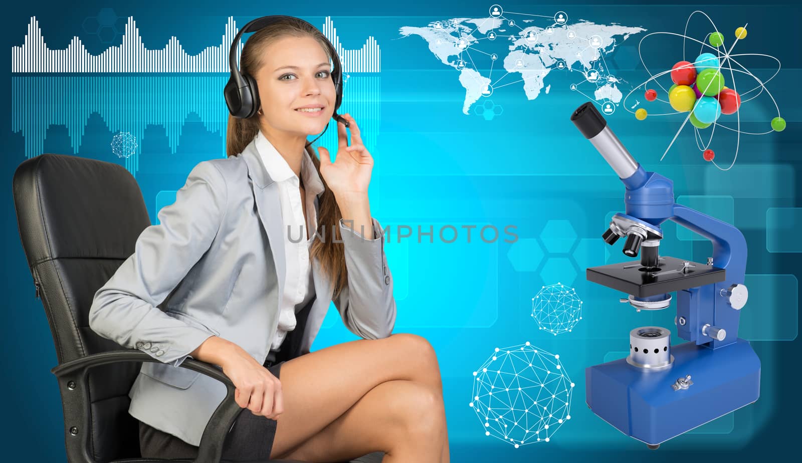 Businesswoman in headset, sitting on office chair, her hand on microphone, looking at camera, smiling. Atom model and microscope beside. World map, diagram and other virtual elements as backdrop.