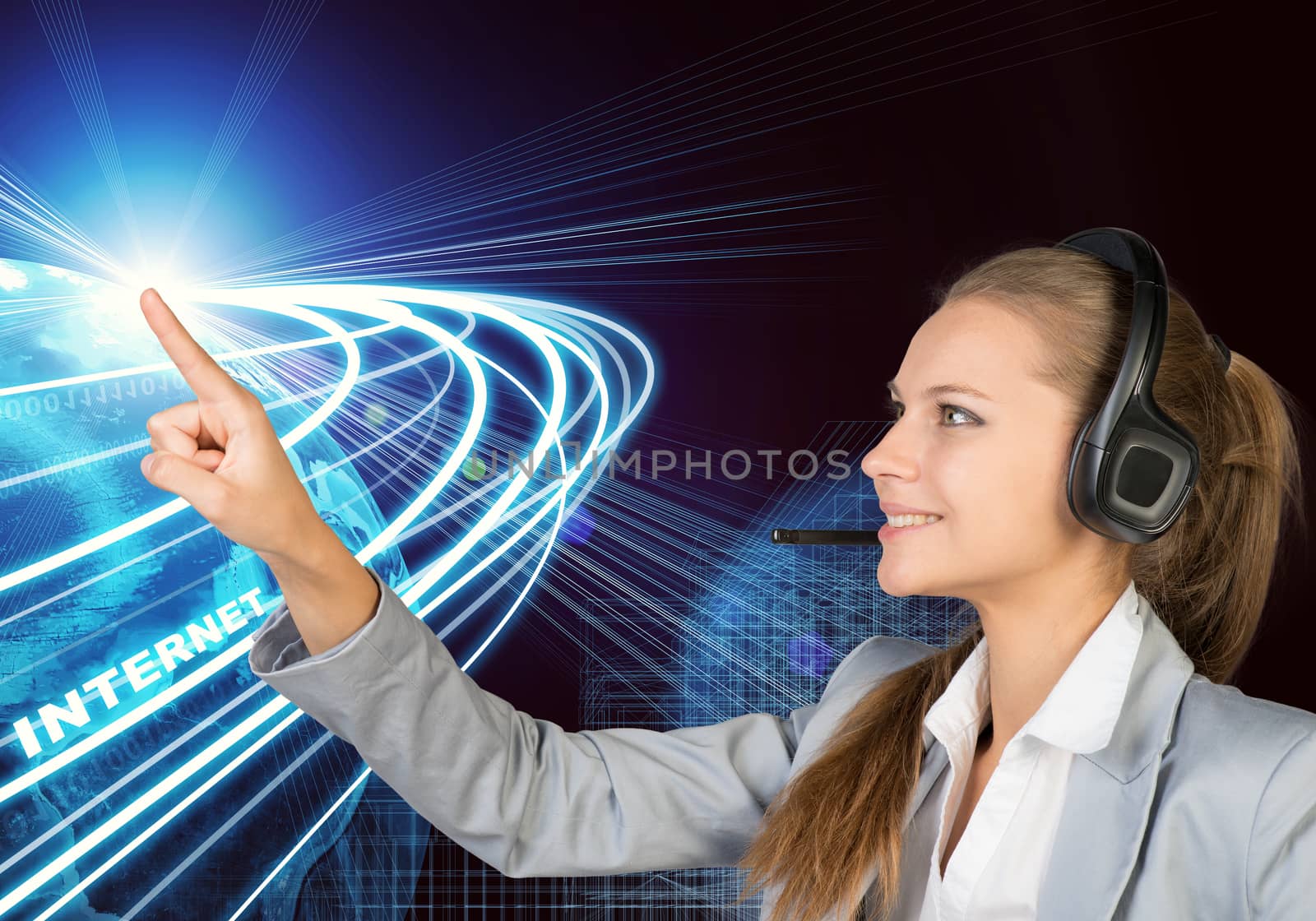 Businesswoman in headset touching or pressing something by cherezoff