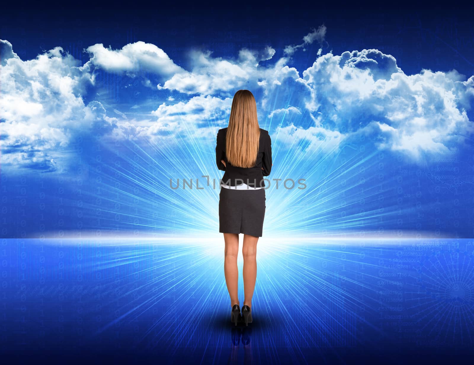 Businesswoman standing against digitally generated spacy blue landscape with rising sun and cloudy sky