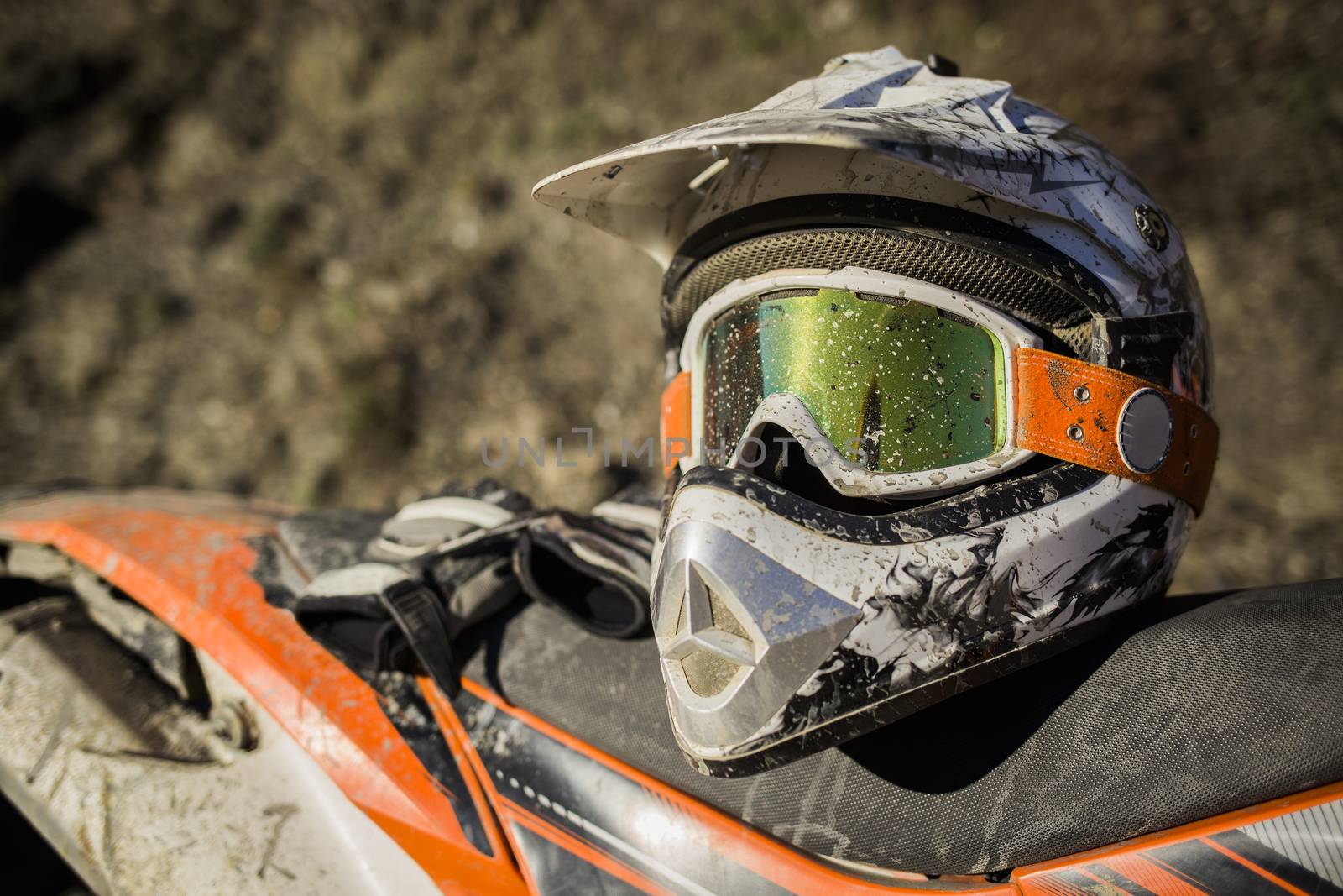Dirty motorcycle motocross helmet with goggles by Kor