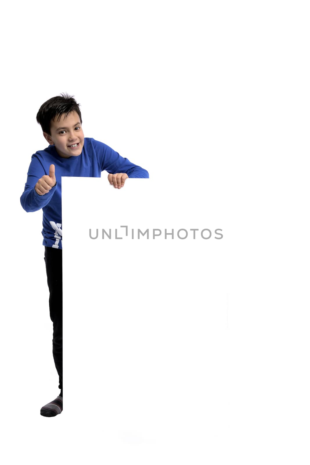 A young child is holding a blank, white message sign on an isolated, white background. Add your text.