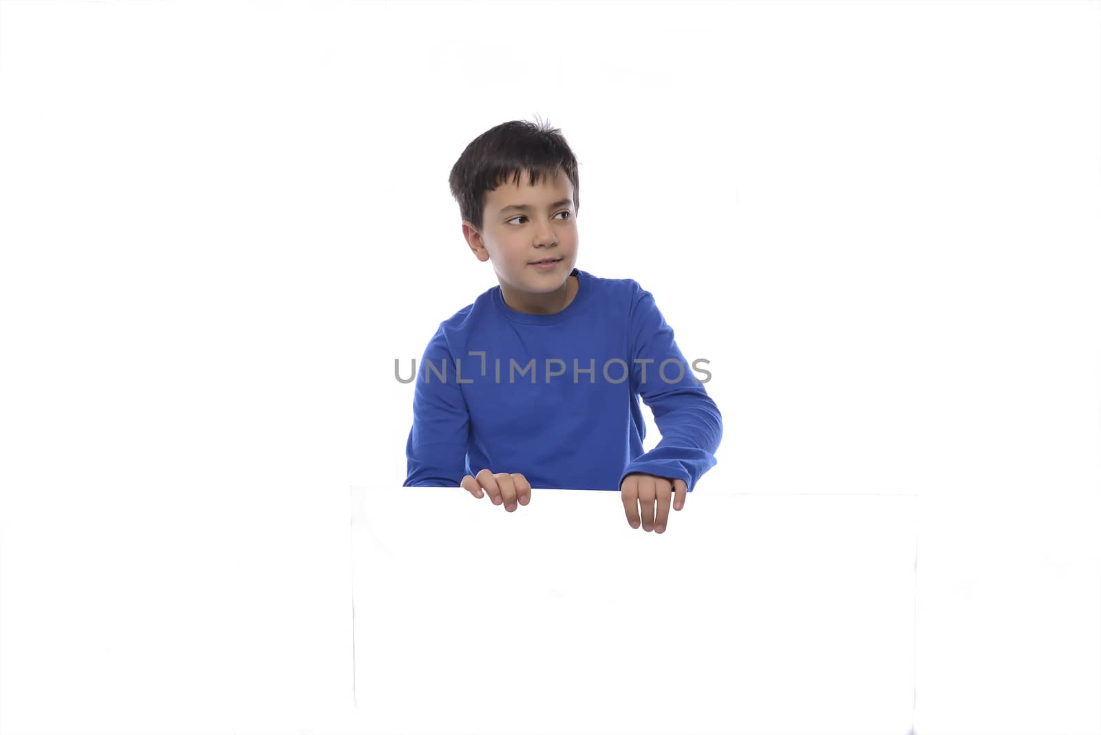 A young child is holding a blank, white message sign on an isolated, white background. Add your text.