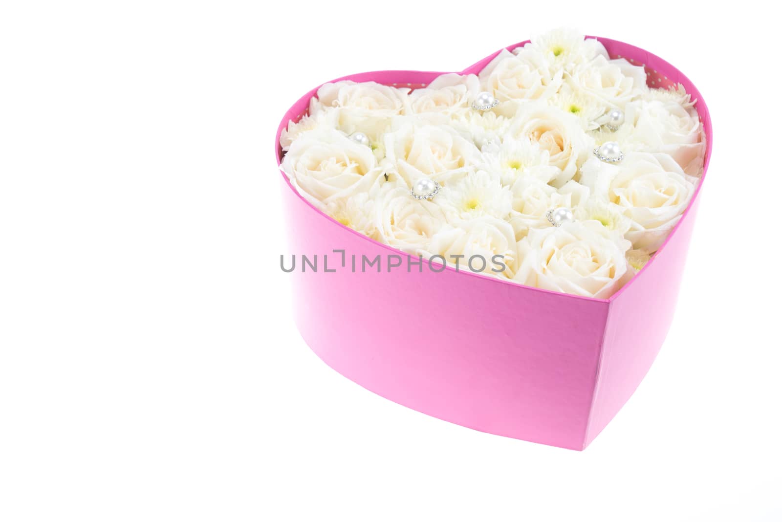 White roses and pearl and diamond held in the heart shape box by iamway