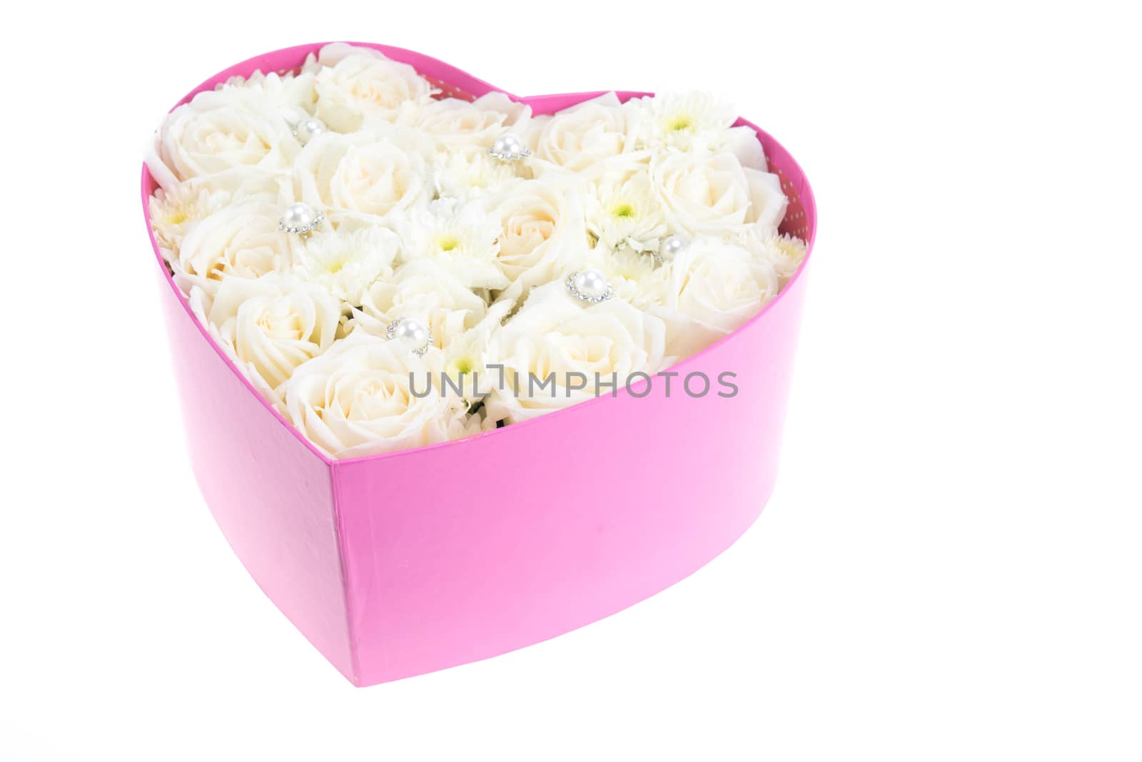 White roses and pearl and diamond held in the heart shape box by iamway
