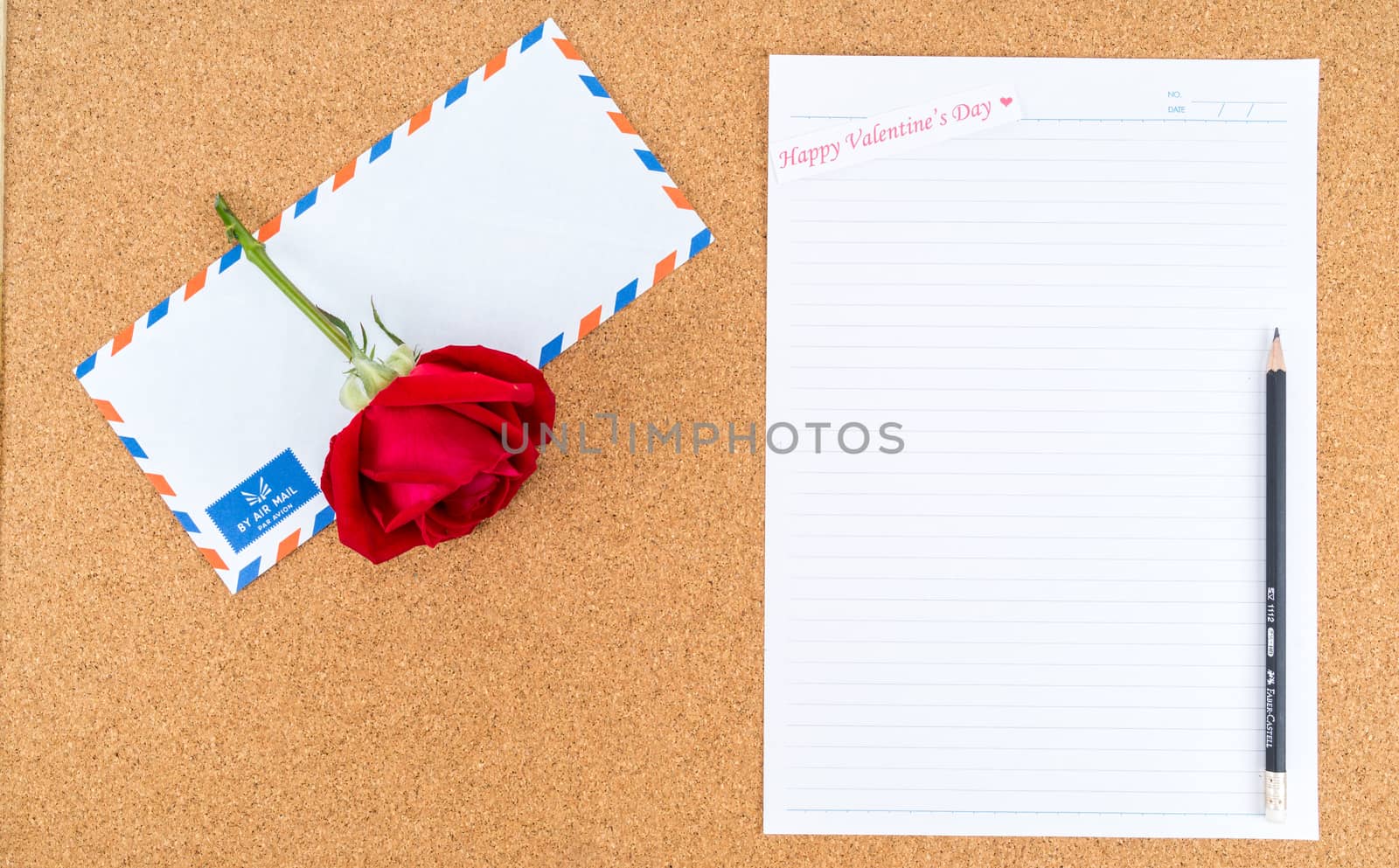 Cardboard, corkboard with note paper with pencil and rose beside by iamway