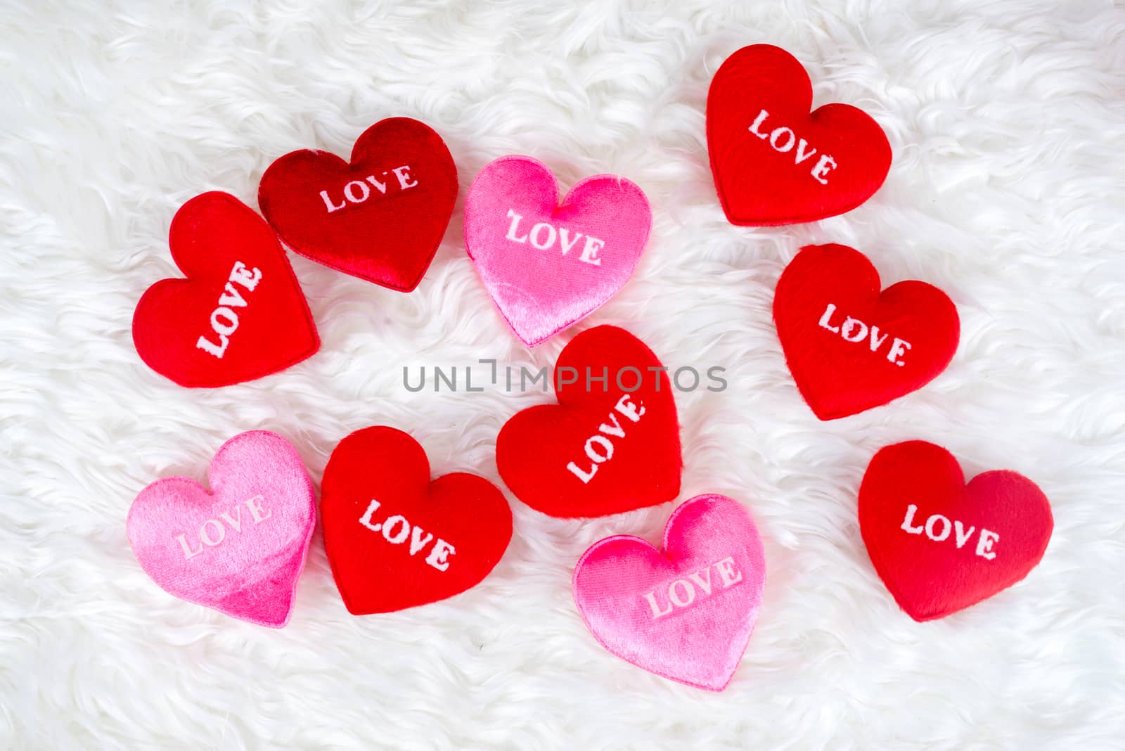 Decorated gifts with a heart shapes and text "love" by iamway